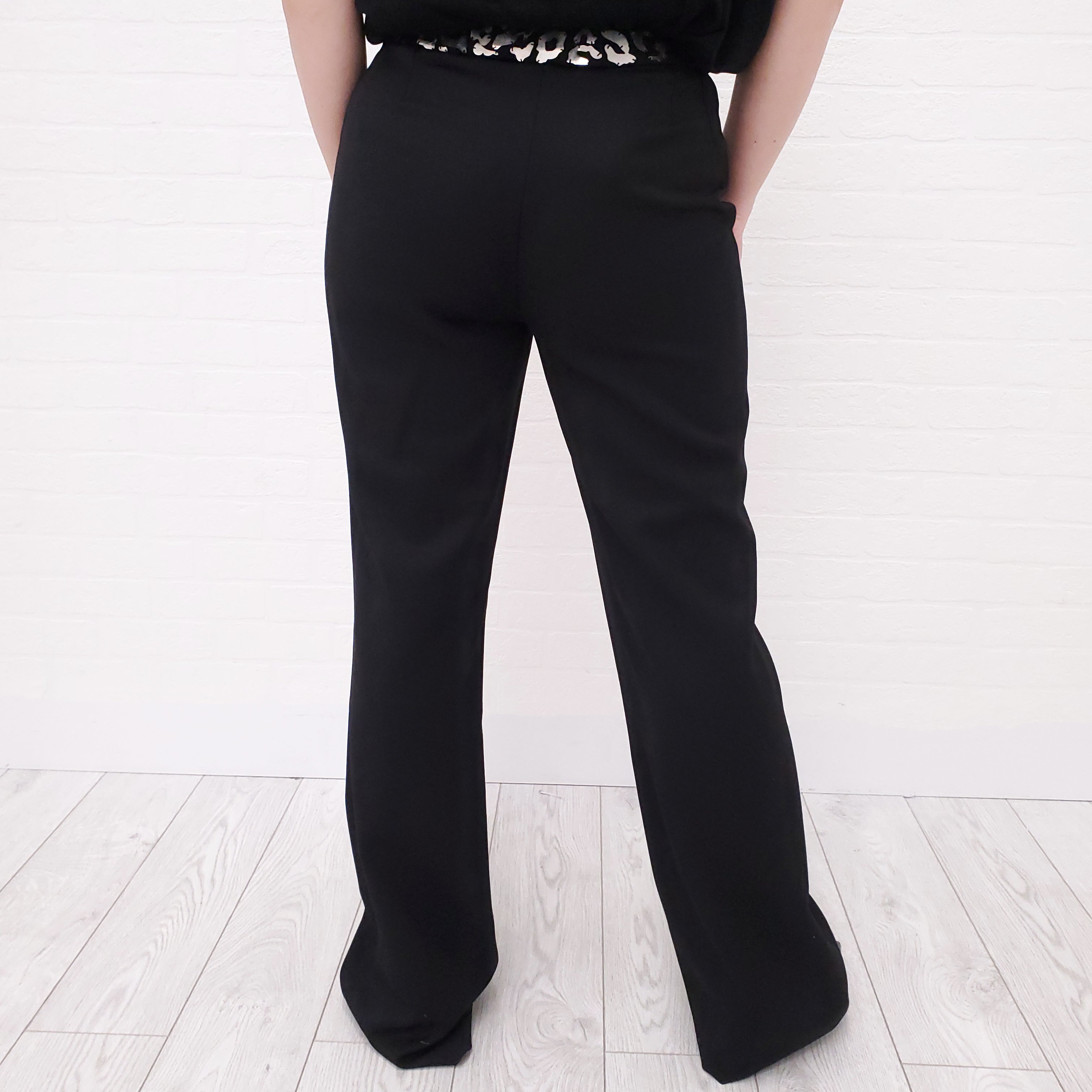 GIANNI VERSACE BLACK PANTS WITH LEOPARD HARDWARE - SIZE 42