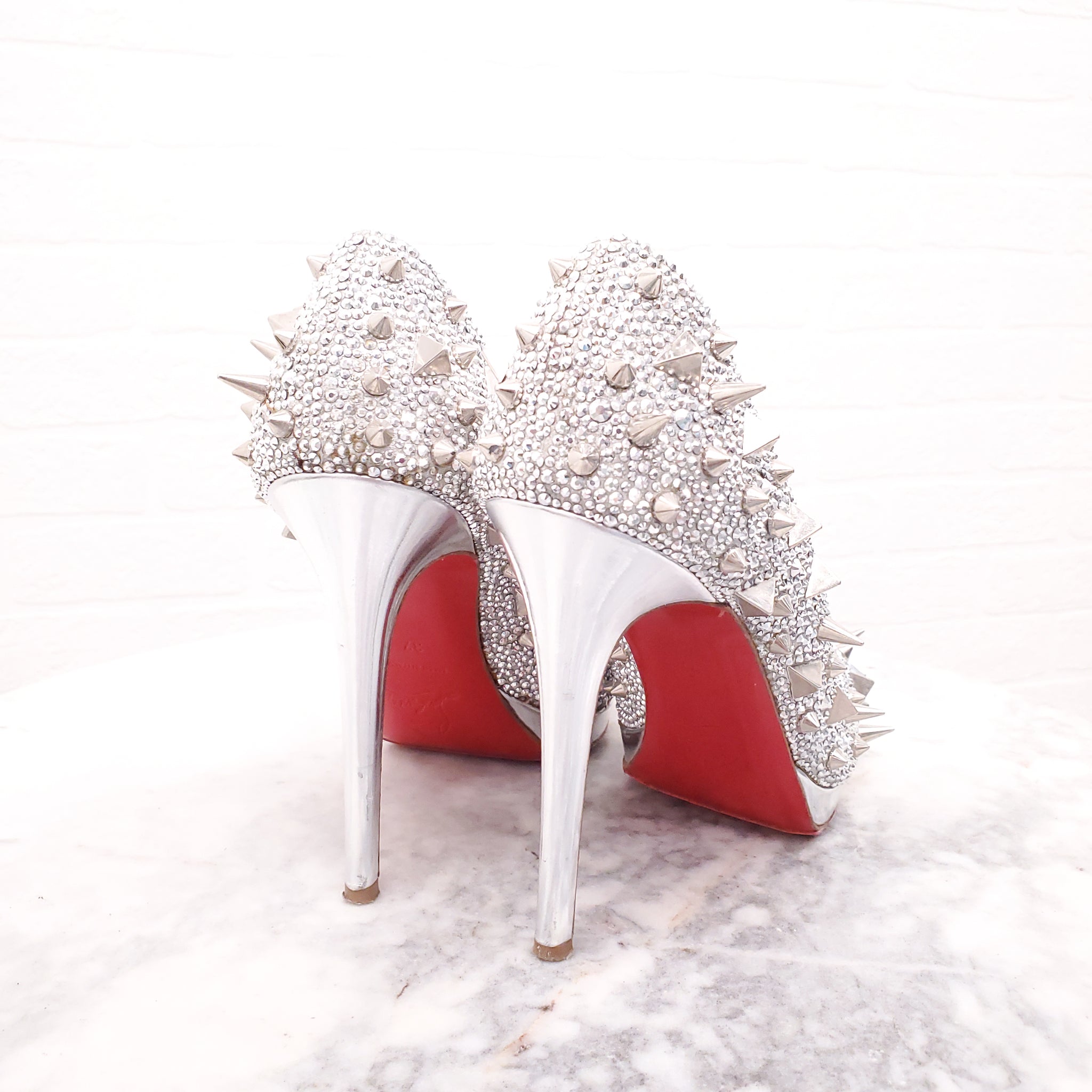 Christian louboutin silver heels best sale