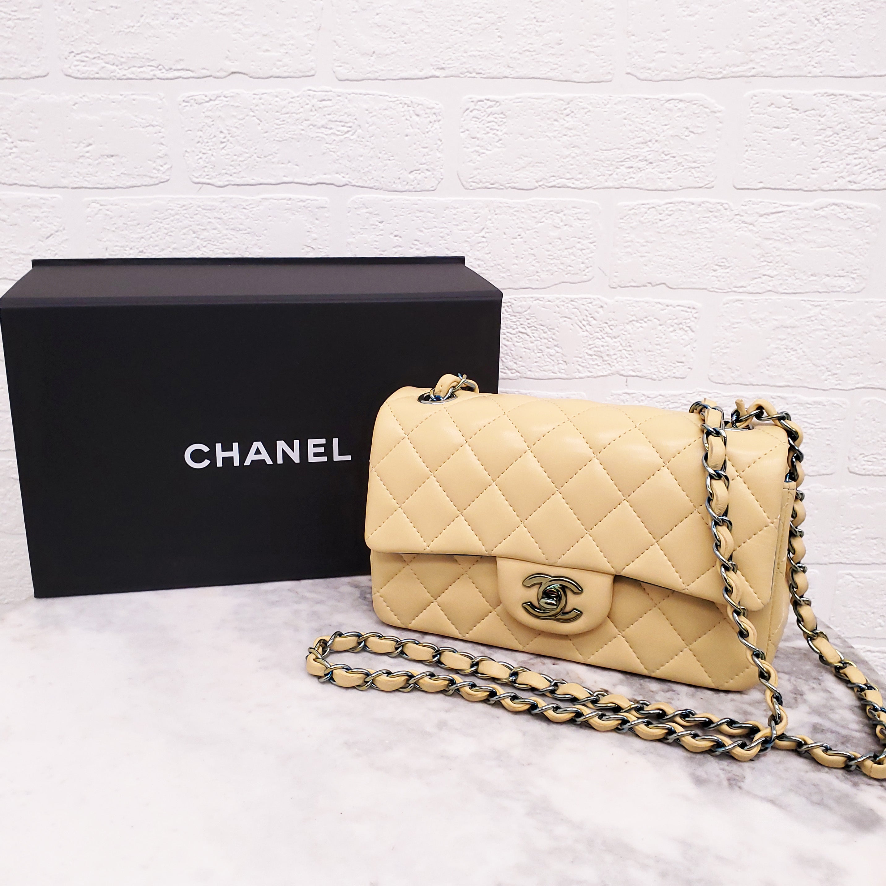 CHANEL YELLOW MINI FLAP BAG