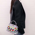 FENDI GREY LEATHER AND COLOURFUL RAFFIA FLORAL MINI PEEKABOO BAG