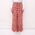 THE GREAT RED AND CREAM FLORAL TROUSERS - SIZE 30 (STRETCH WAISTBAND)