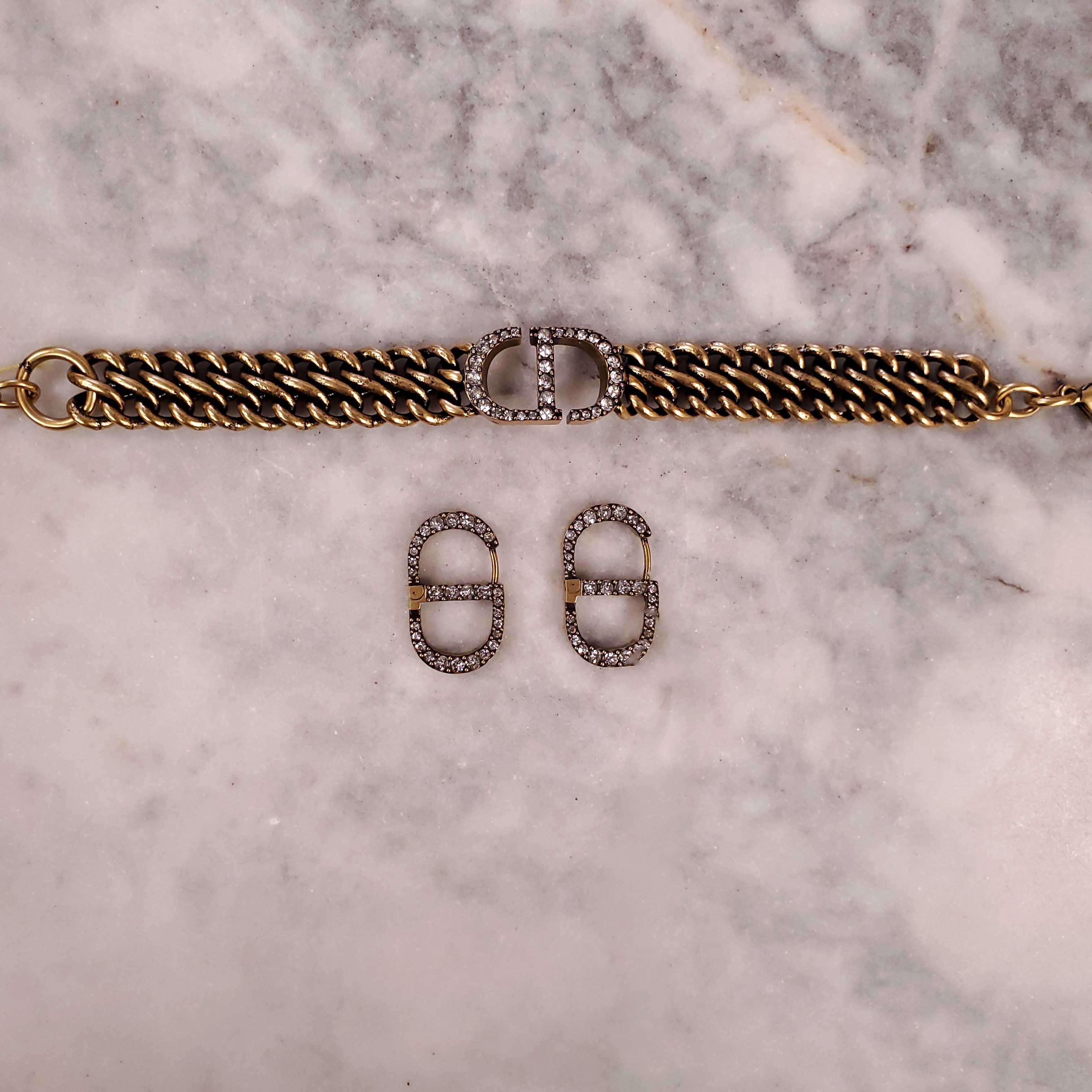 CHRISTIAN DIOR GOLD BRACELET AND EARRINGS SET WITH DIAMANTE CD DETAIL