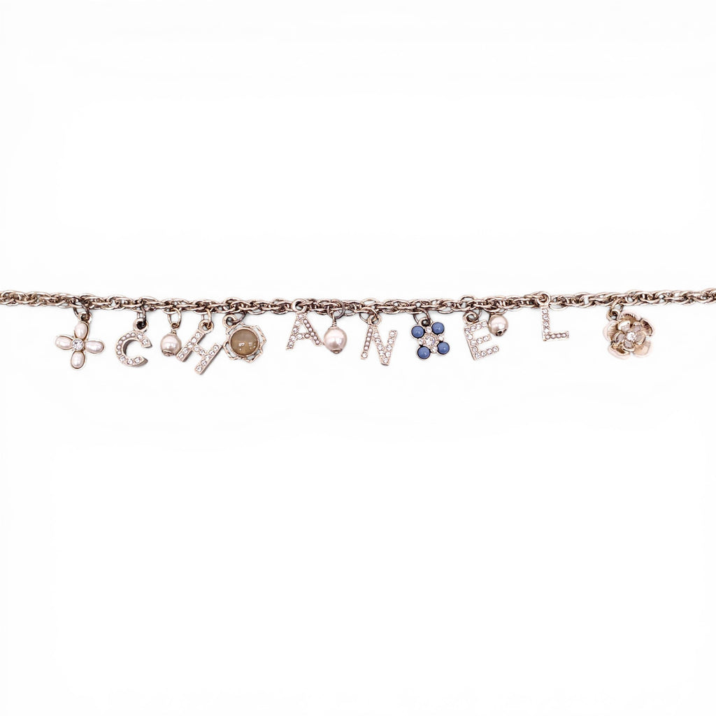 CHANEL GOLD LETTER CRYSTAL FLOWER CHAIN NECKLACE
