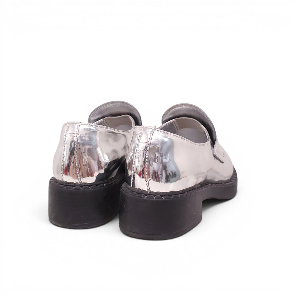 PRADA SILVER LOGO LOAFERS - SIZE 38