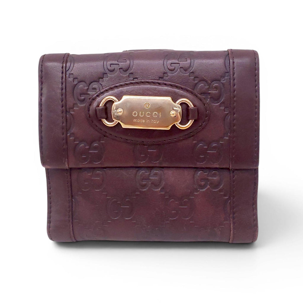 GUCCI BROWN LEATHER MONOGRAM EMBOSSED WALLET