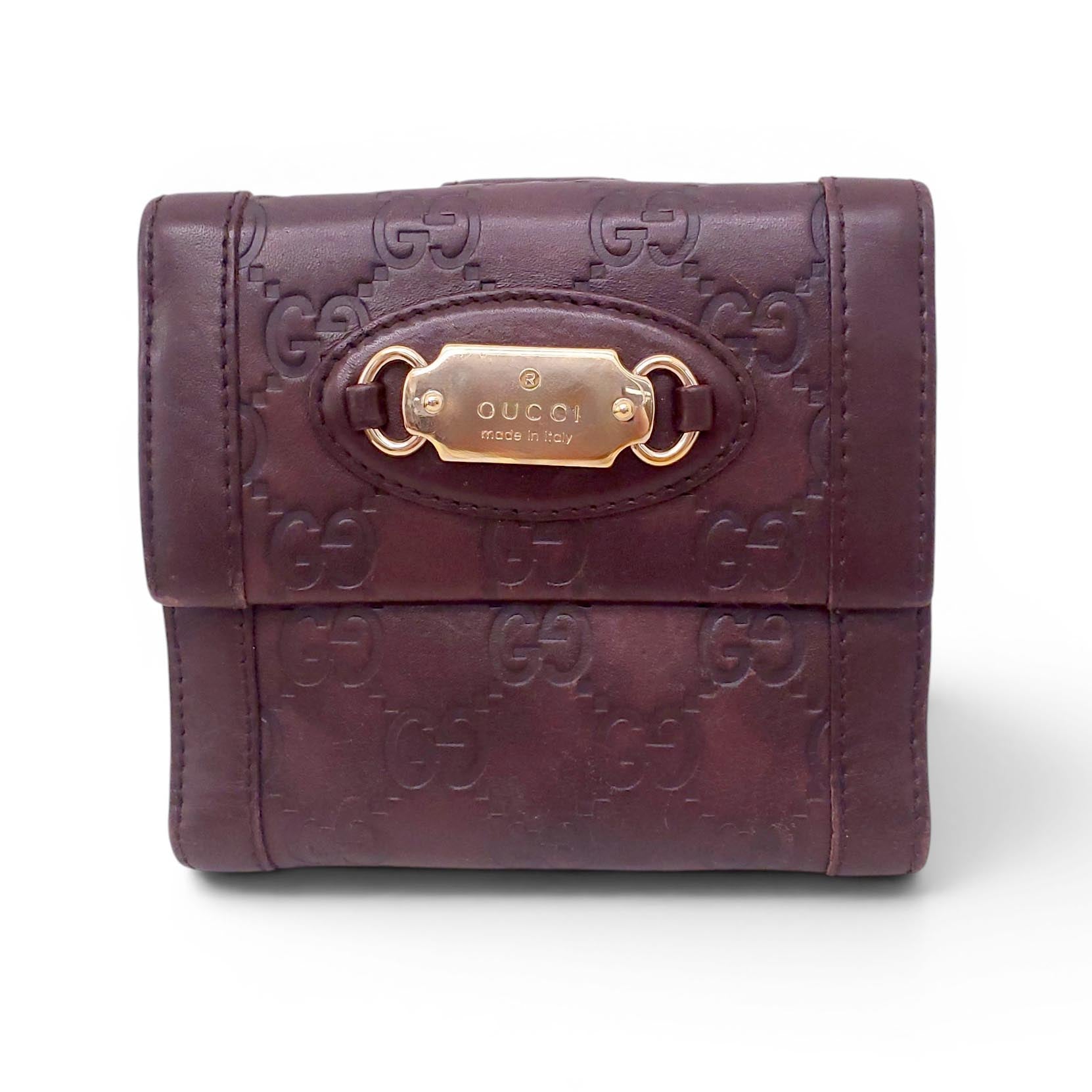 GUCCI BROWN LEATHER MONOGRAM EMBOSSED WALLET