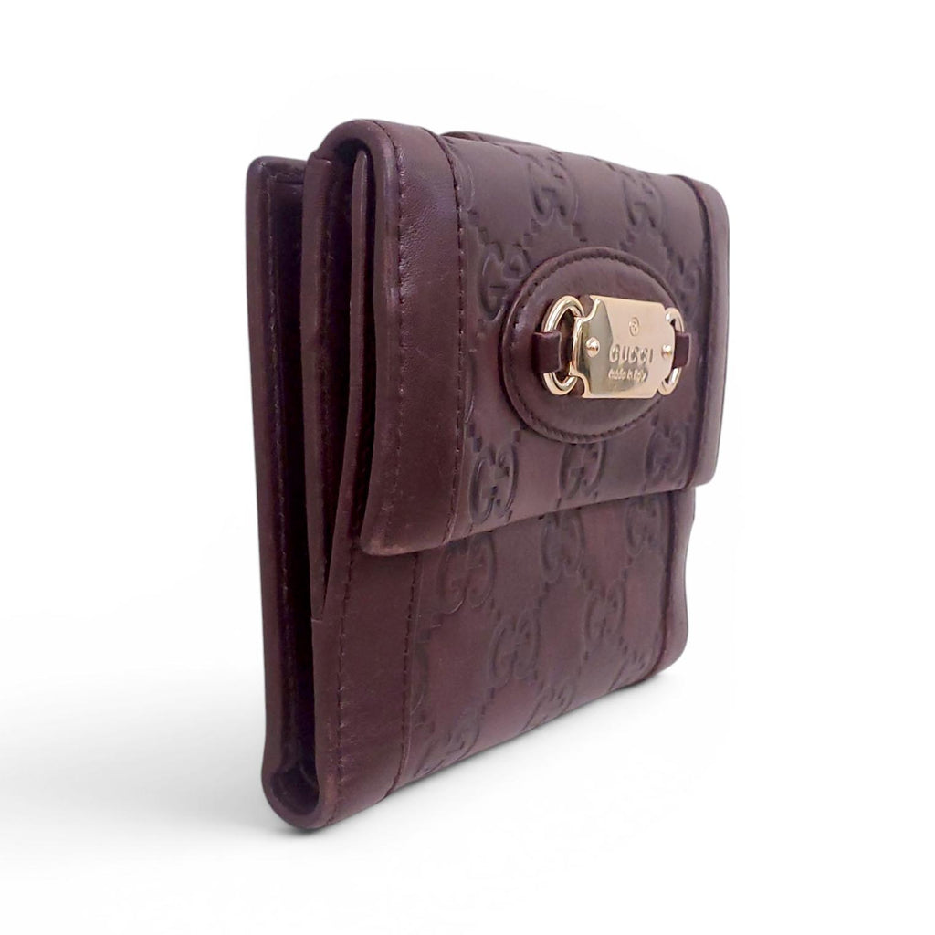 GUCCI BROWN LEATHER MONOGRAM EMBOSSED WALLET