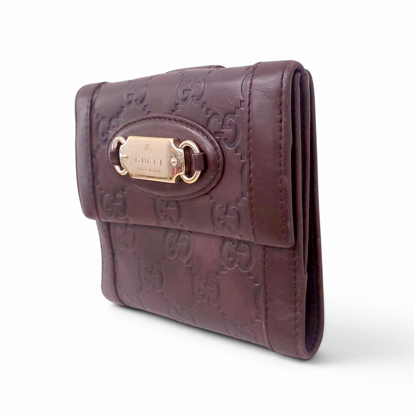 GUCCI BROWN LEATHER MONOGRAM EMBOSSED WALLET