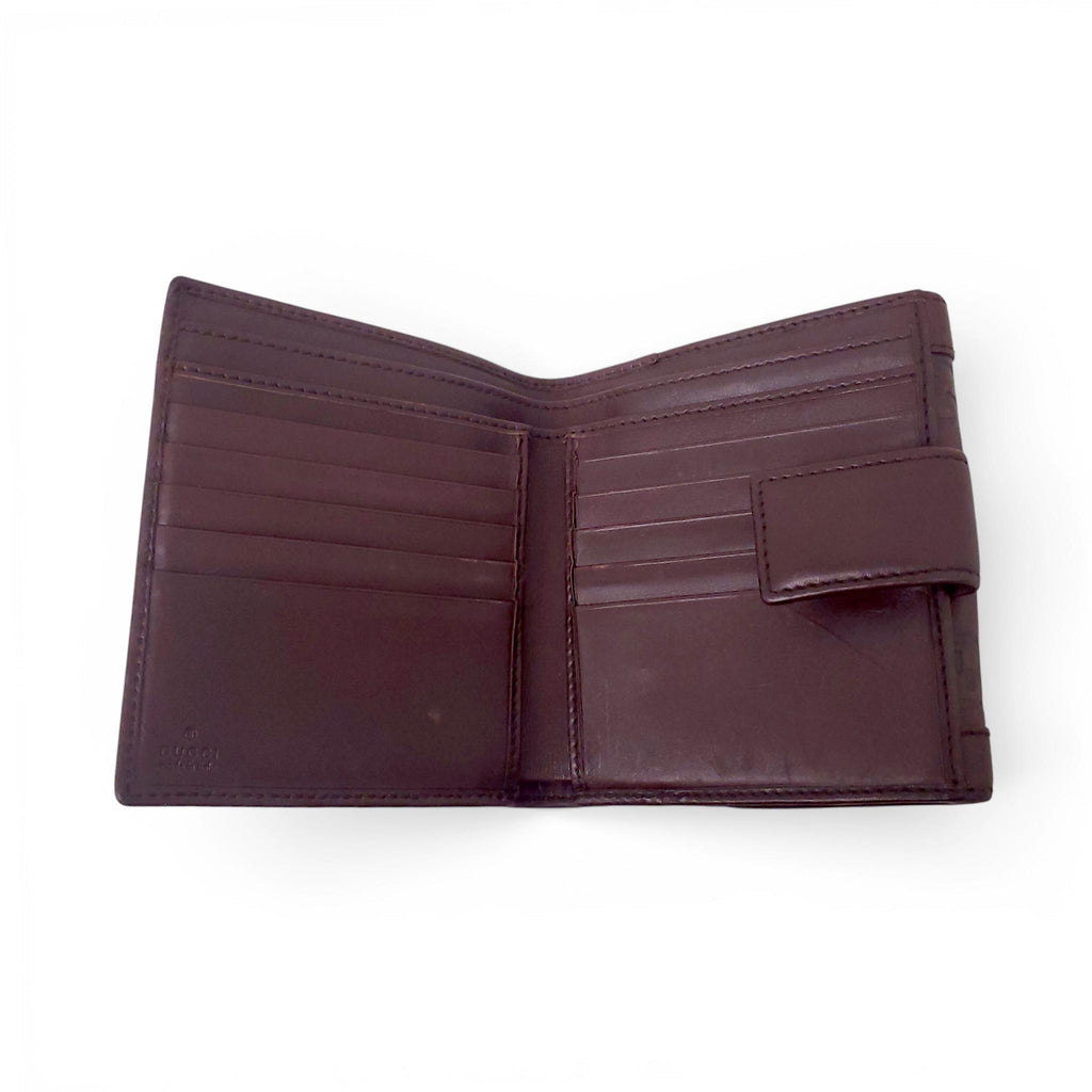 GUCCI BROWN LEATHER MONOGRAM EMBOSSED WALLET