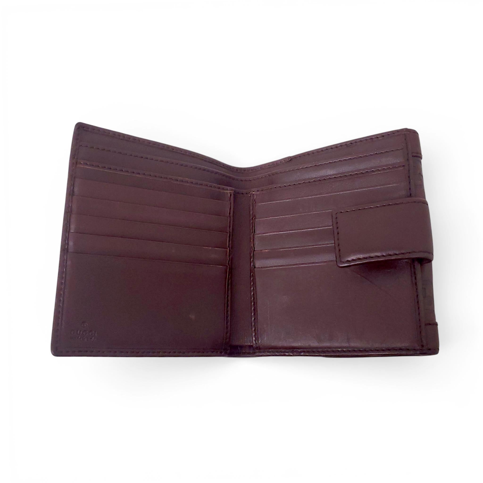 GUCCI BROWN LEATHER MONOGRAM EMBOSSED WALLET