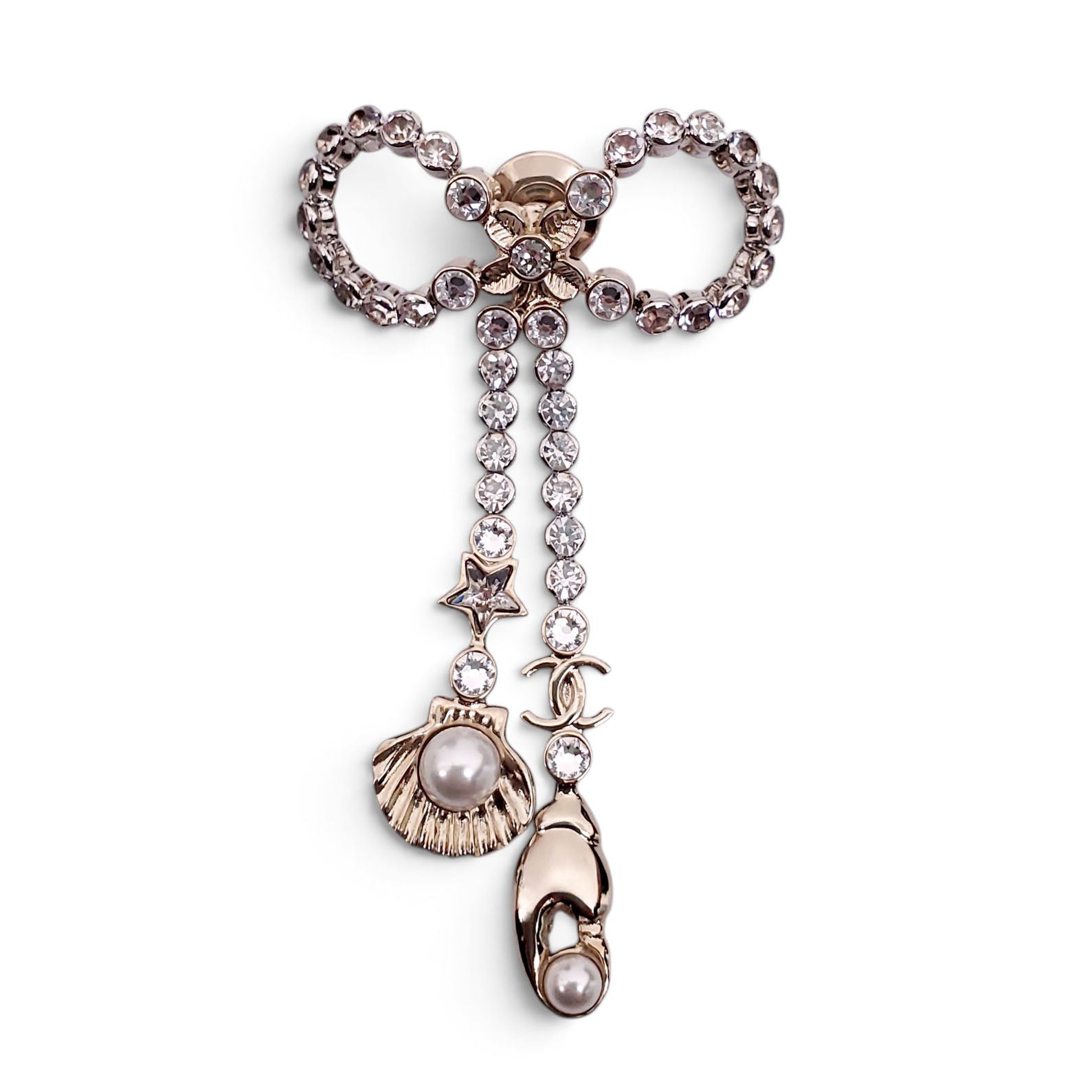 CHANEL CRYSTAL BOW BROOCH WITH SEASHELL AND LOBSTER CLAW