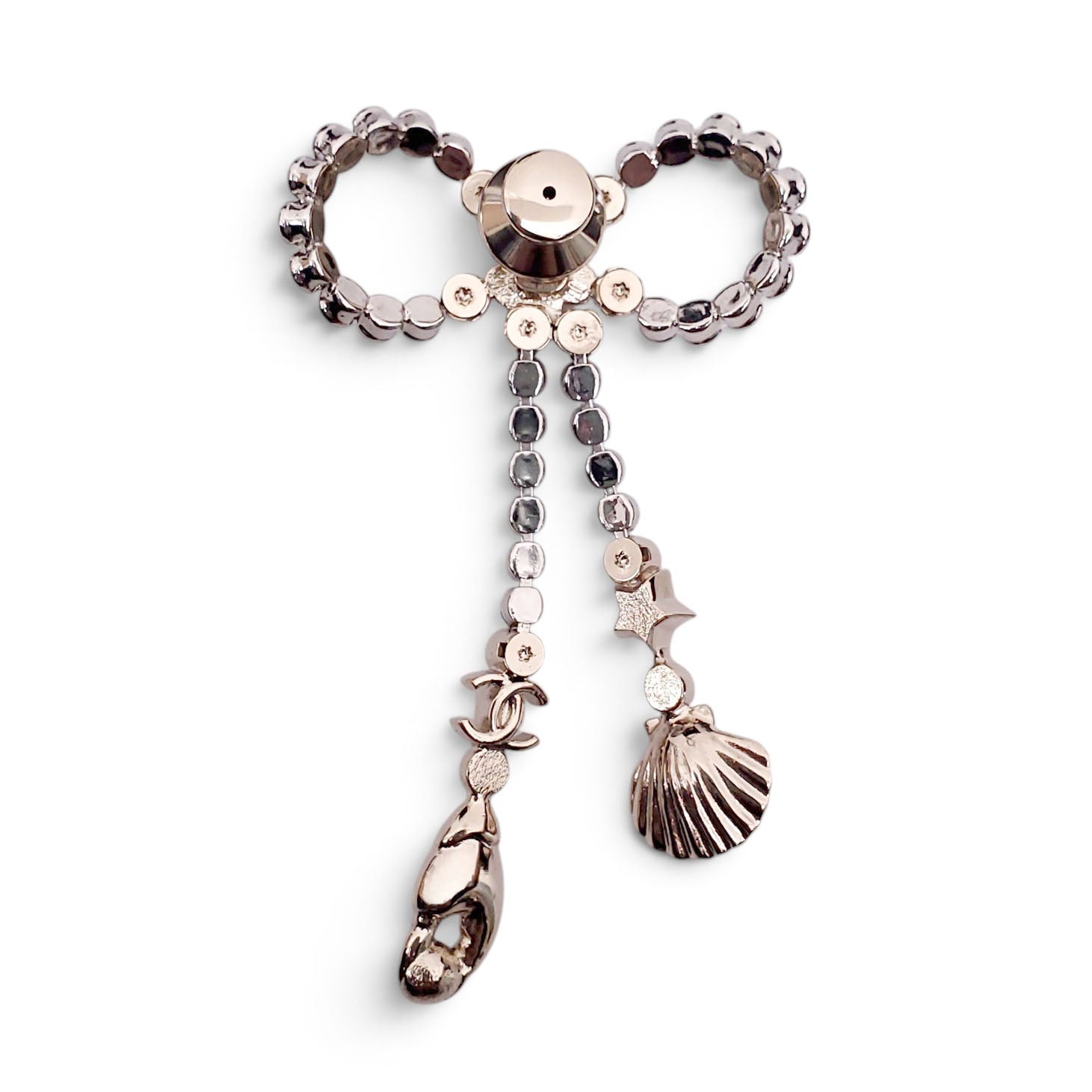 CHANEL CRYSTAL BOW BROOCH WITH SEASHELL AND LOBSTER CLAW