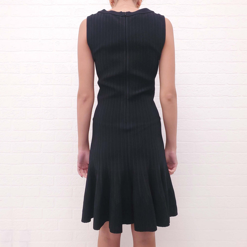 ALAÏA BLACK AND GREY RIBBED FITTED PEPLUM DRESS - SIZE 40