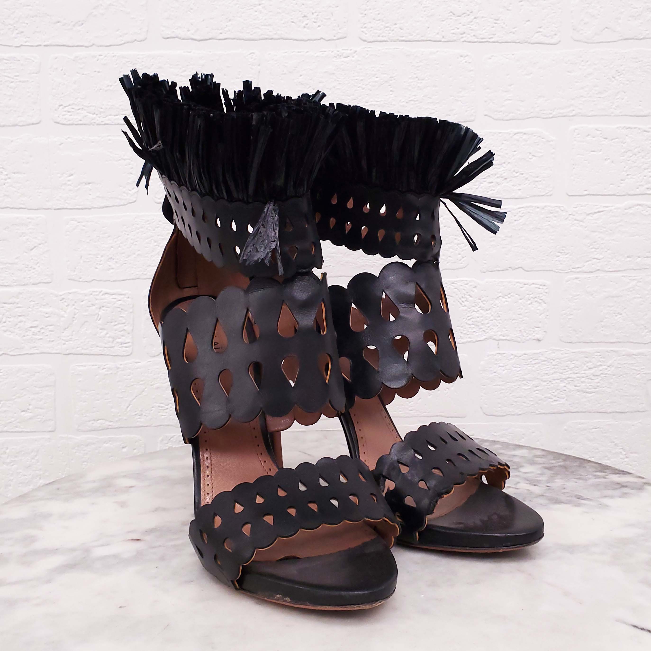 ALAÏA BLACK LASER CUT FRINGE HEELS - SIZE 41
