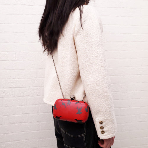 ALEXANDER MCQUEEN RED AND BLACK PATTERNED SKULLS CLUTCH