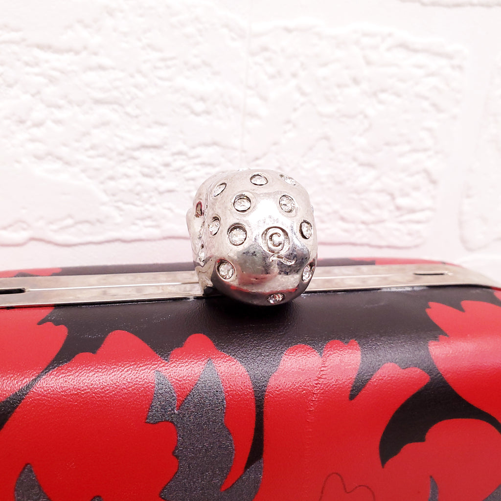ALEXANDER MCQUEEN RED AND BLACK PATTERNED SKULLS CLUTCH