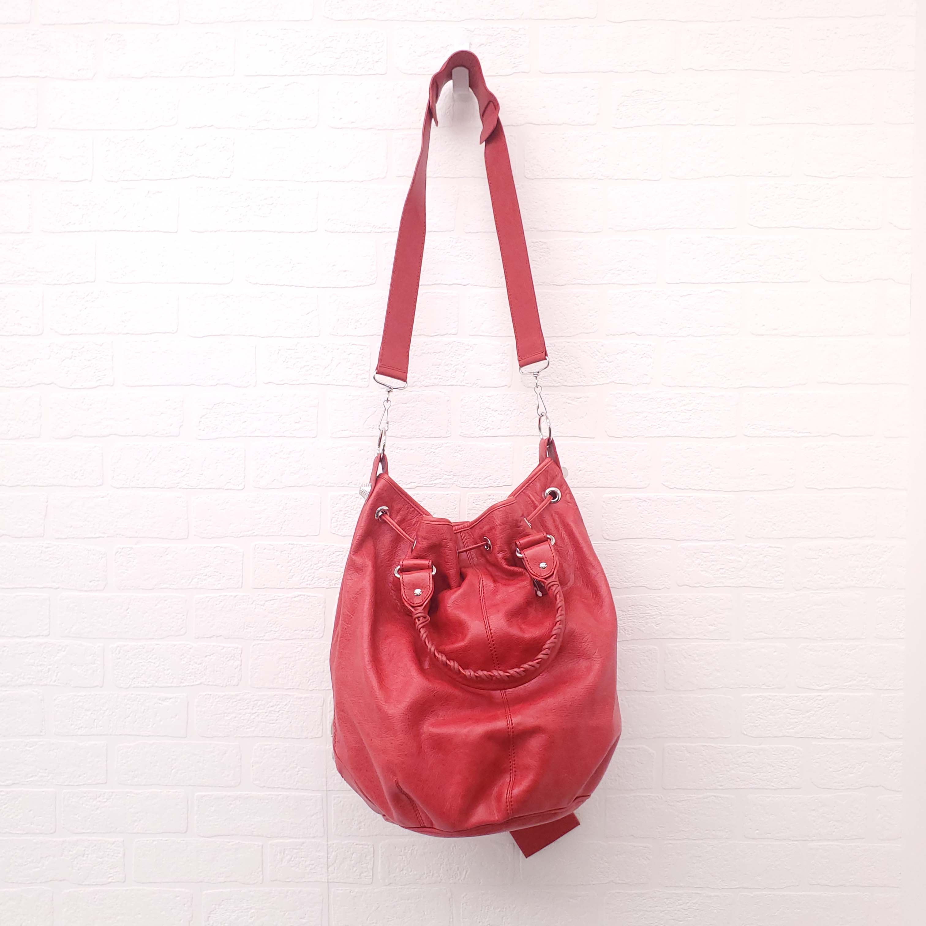 BALENCIAGA RED GIANT 'MOTOCROSS CITY' BUCKET BAG WITH SILVER GROMMETS