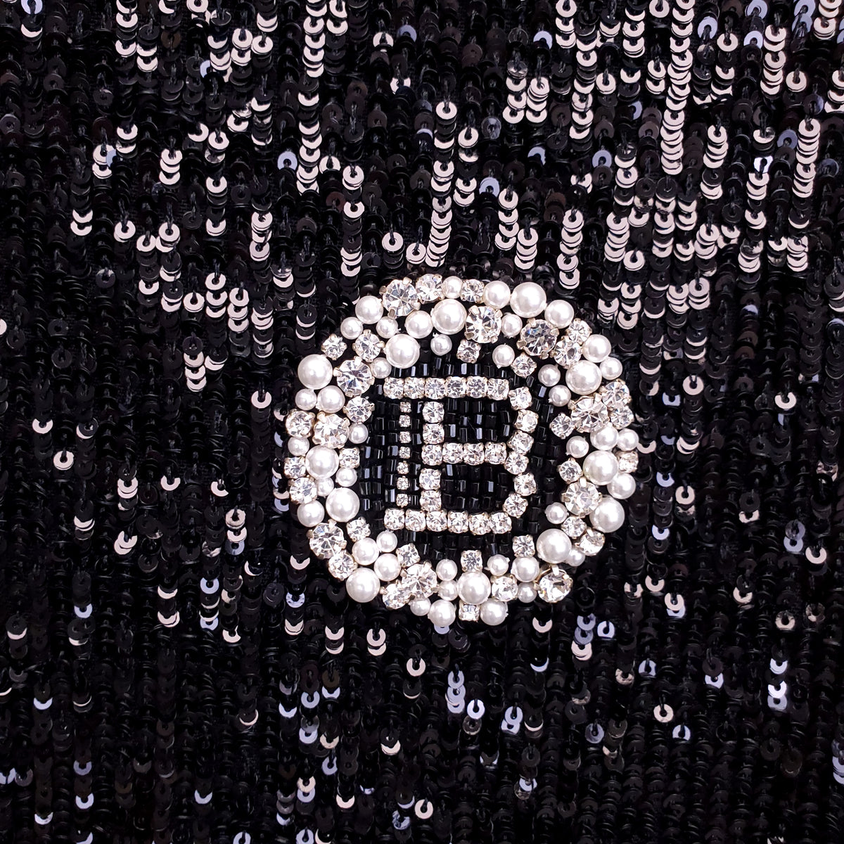 BALMAIN BLACK SEQUIN SHORT SLEEVE POLO WITH CRYSTAL LOGO - SIZE 36