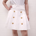BALMAIN WHITE DENIM MINI SKIRT WITH GOLD LOGO BUTTONS - SIZE 44