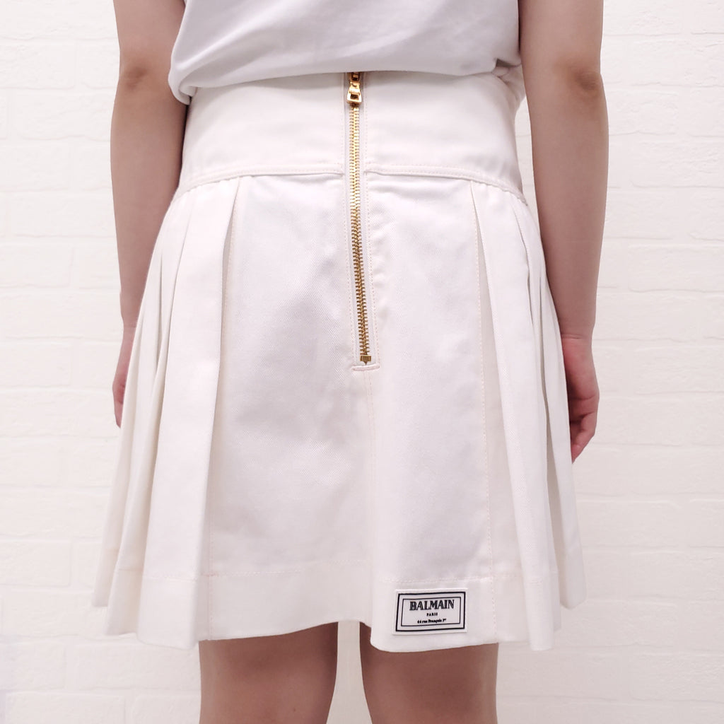 BALMAIN WHITE DENIM MINI SKIRT WITH GOLD LOGO BUTTONS - SIZE 44
