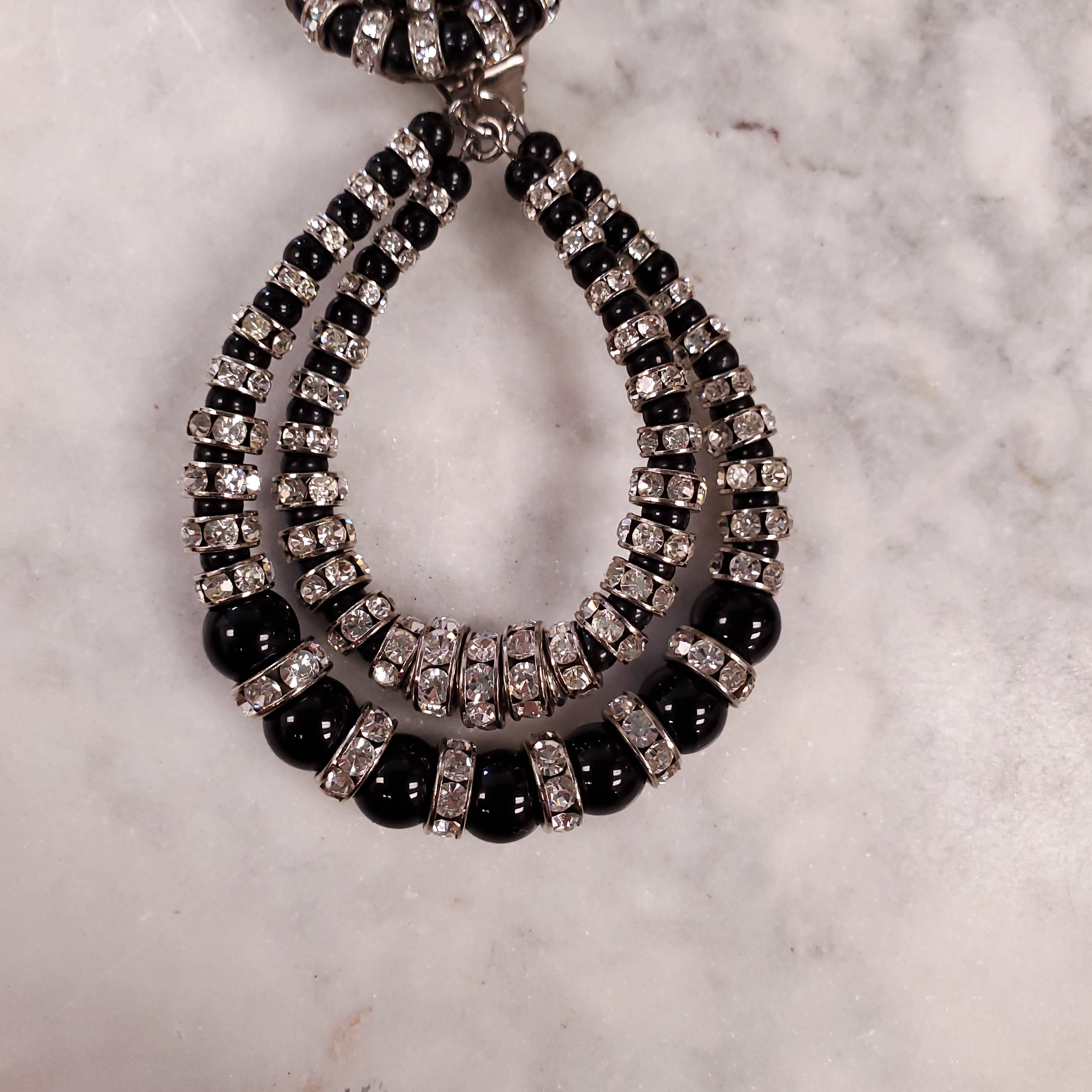 BLACK RODELL AND DIAMANTE ONE DROP AND DOUBLE HOOP EARRINGS