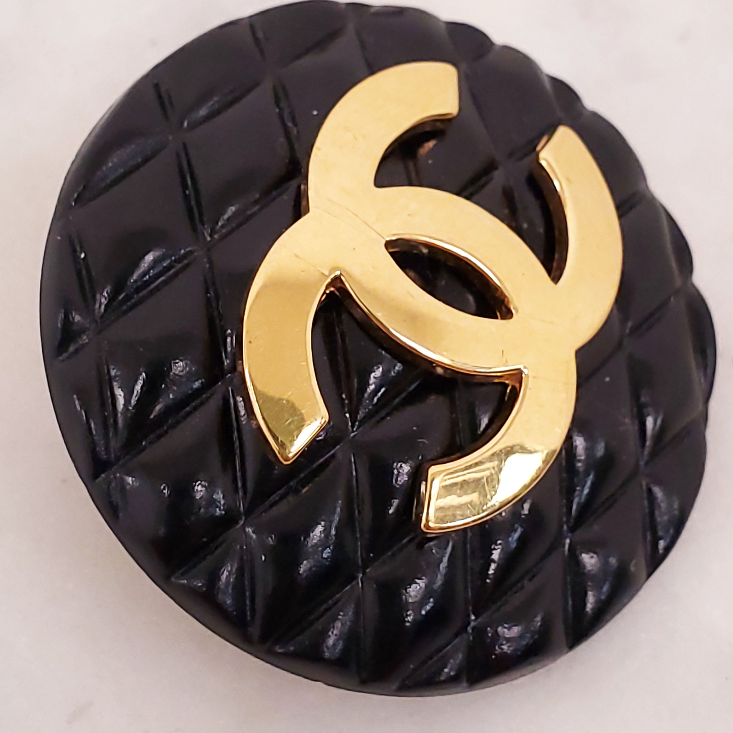 CHANEL 1986 BLACK QUILTED EARRINGS WITH GOLD CC LOGO