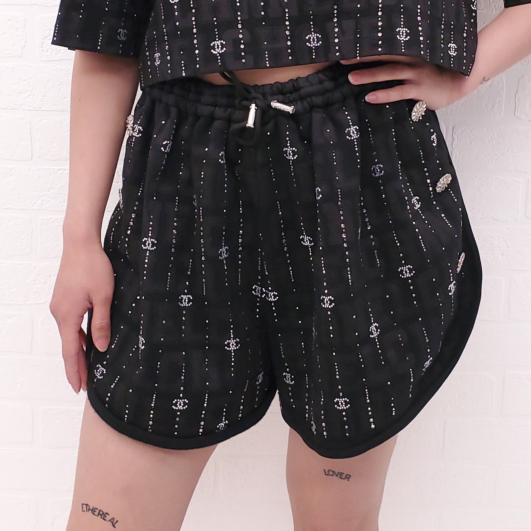 CHANEL 2023 CRUISE COLLECTION BLACK LOGO SHORTS WITH CRYSTAL DETAIL - SIZE 38