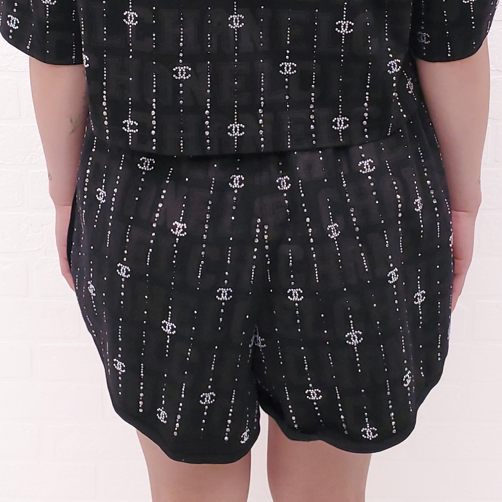 CHANEL 2023 CRUISE COLLECTION BLACK LOGO SHORTS WITH CRYSTAL DETAIL - SIZE 38
