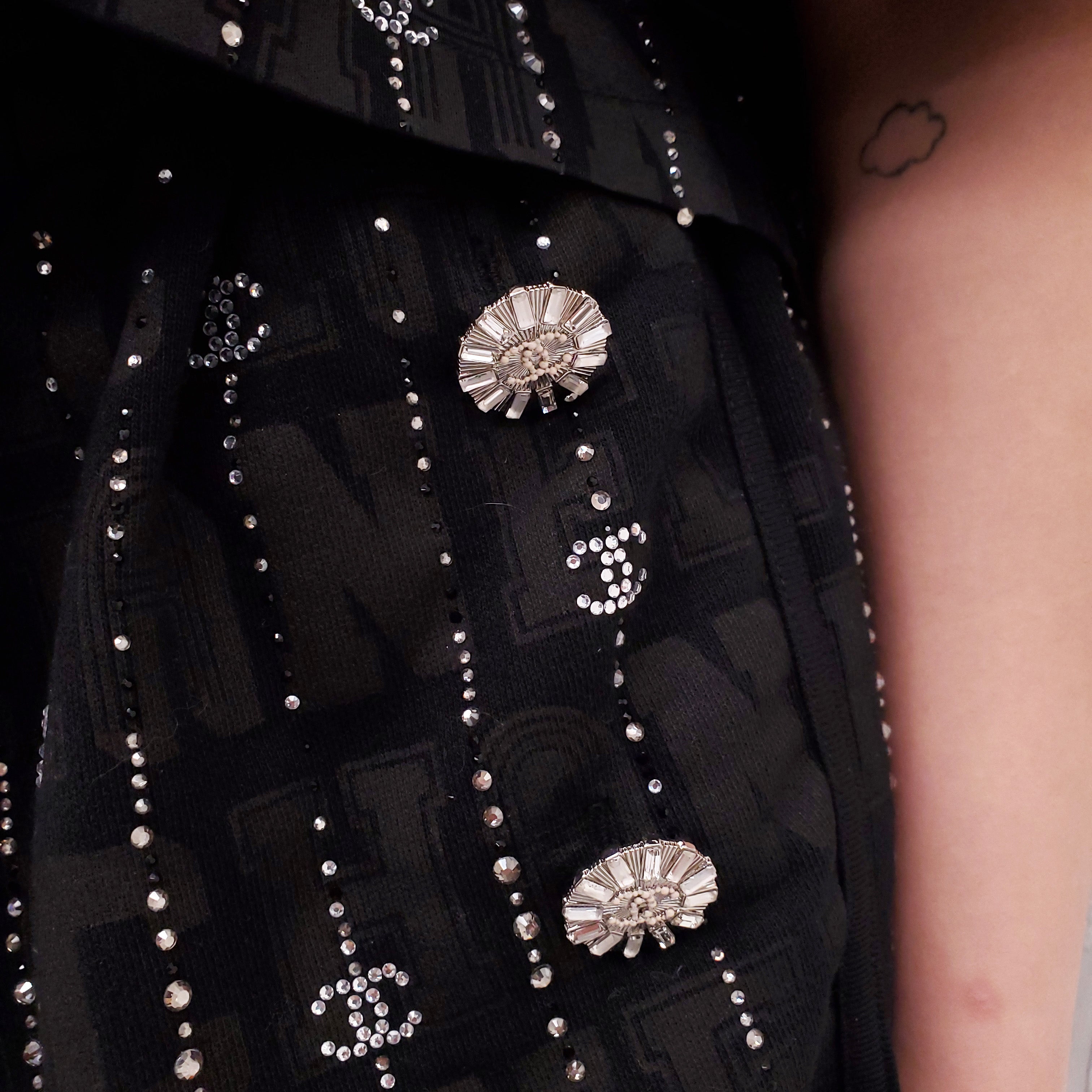 CHANEL 2023 CRUISE COLLECTION BLACK LOGO SHORTS WITH CRYSTAL DETAIL - SIZE 38