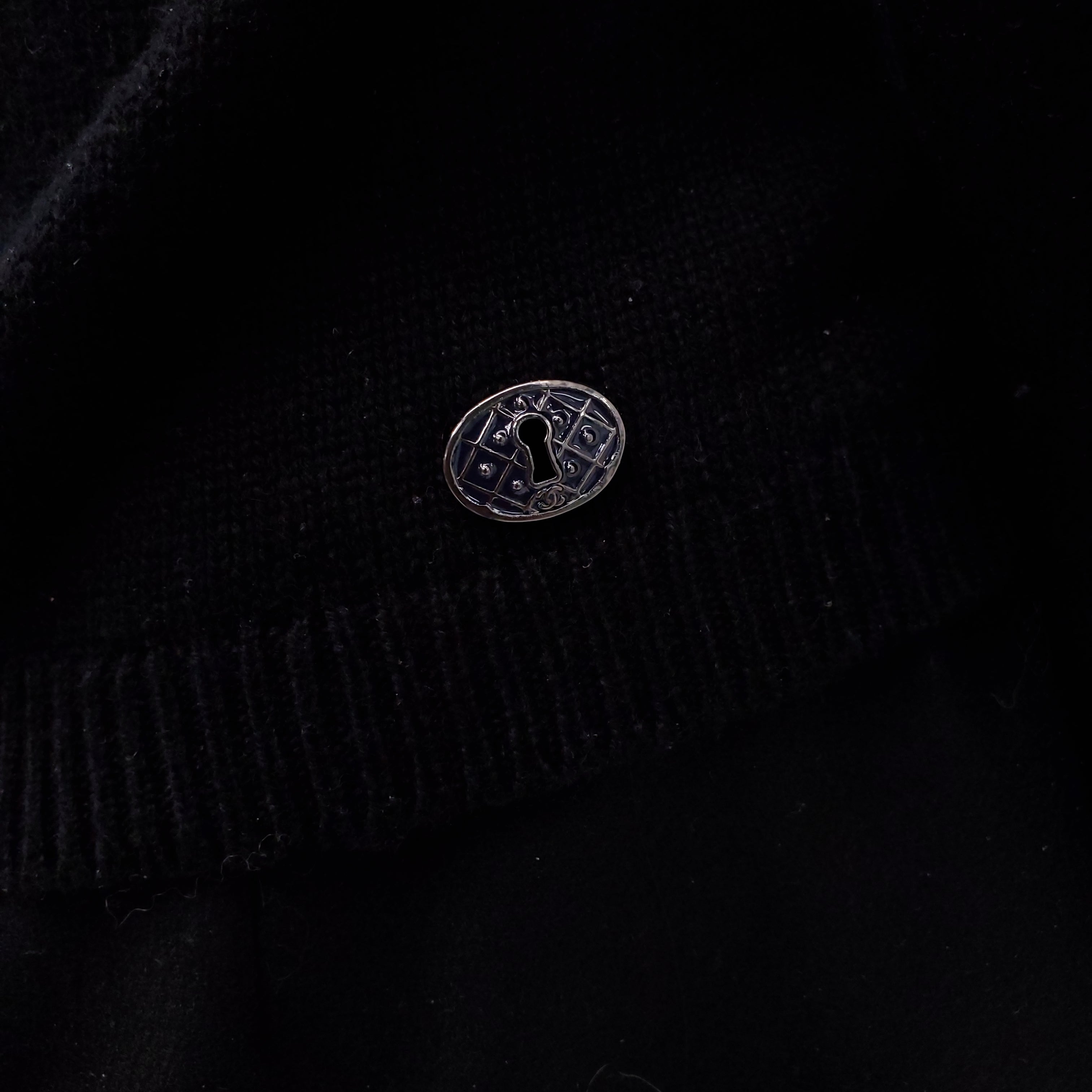 CHANEL BLACK CASHMERE BOW CUT OUT SWEATER WITH LOW BACK - SIZE 34