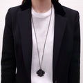 CHANEL BLACK CRYSTAL CROSS WITH LOGO