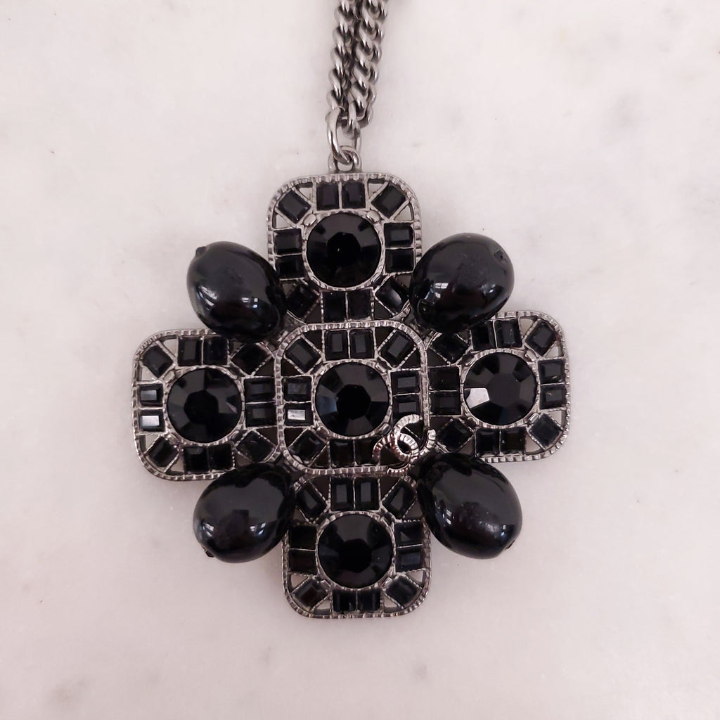 CHANEL BLACK CRYSTAL CROSS WITH LOGO