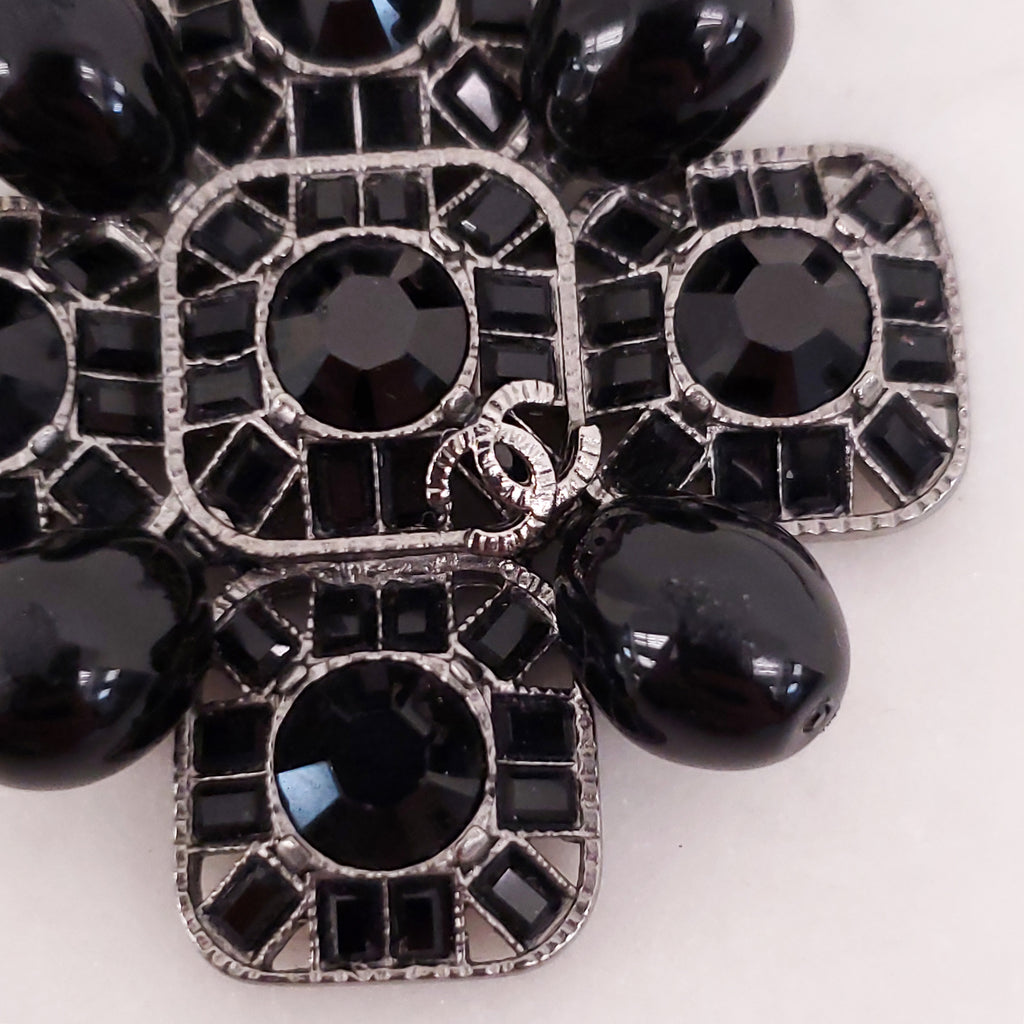 CHANEL BLACK CRYSTAL CROSS WITH LOGO