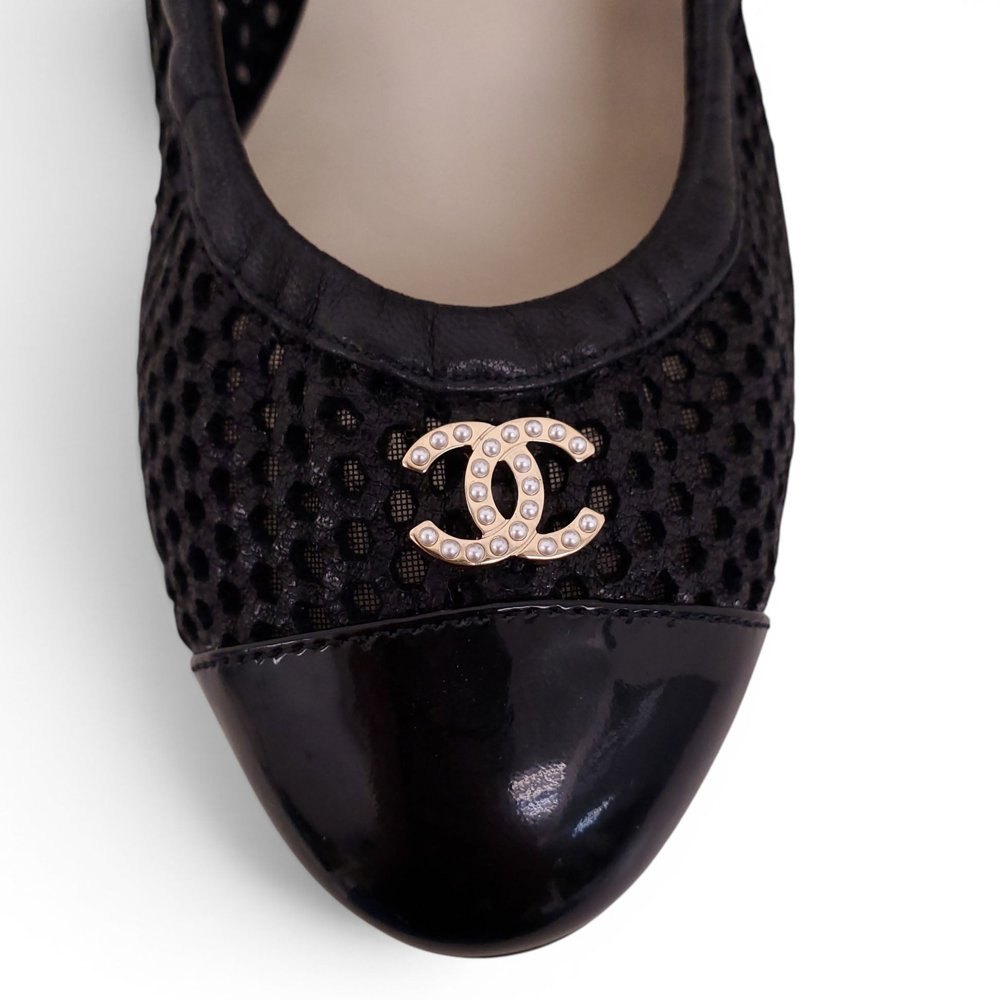 CHANEL BLACK PERFORATED HEELS WITH CRYSTAL LOGO DETAIL - SIZE 38