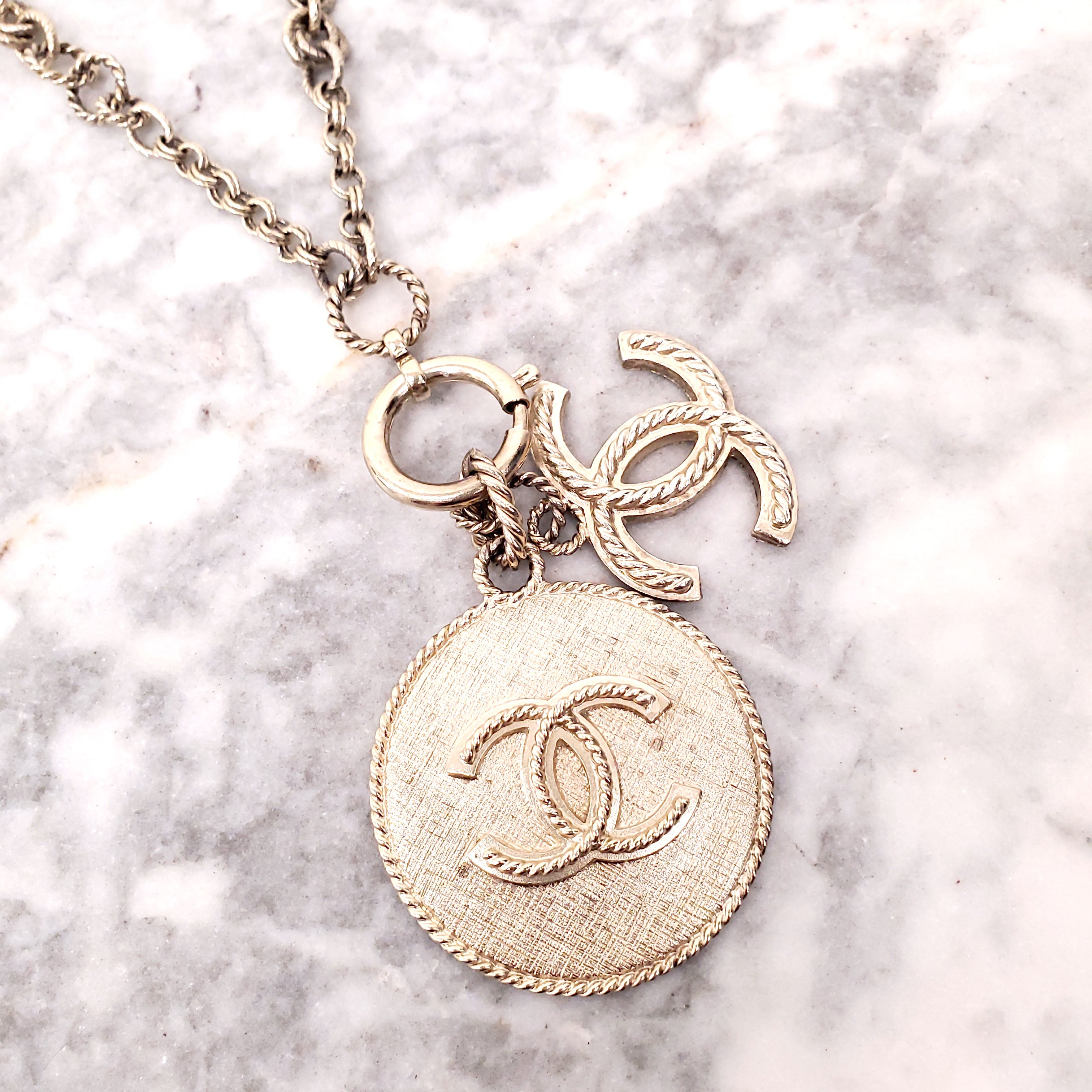 CHANEL CC LOGO AND MEDALLION BRONZE NECKLACE