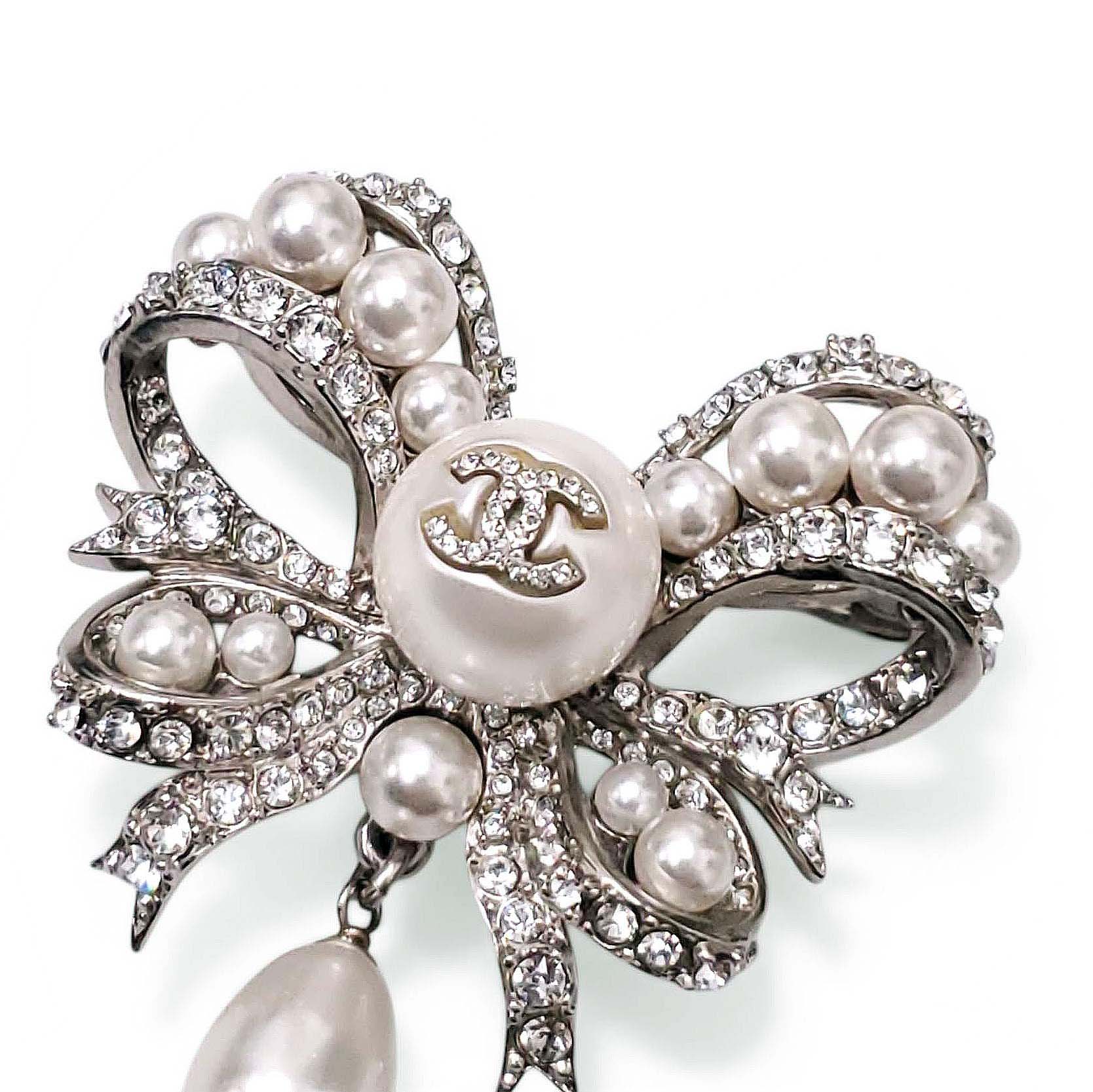 CHANEL CRYSTAL AND PEARL BOW BROOCH