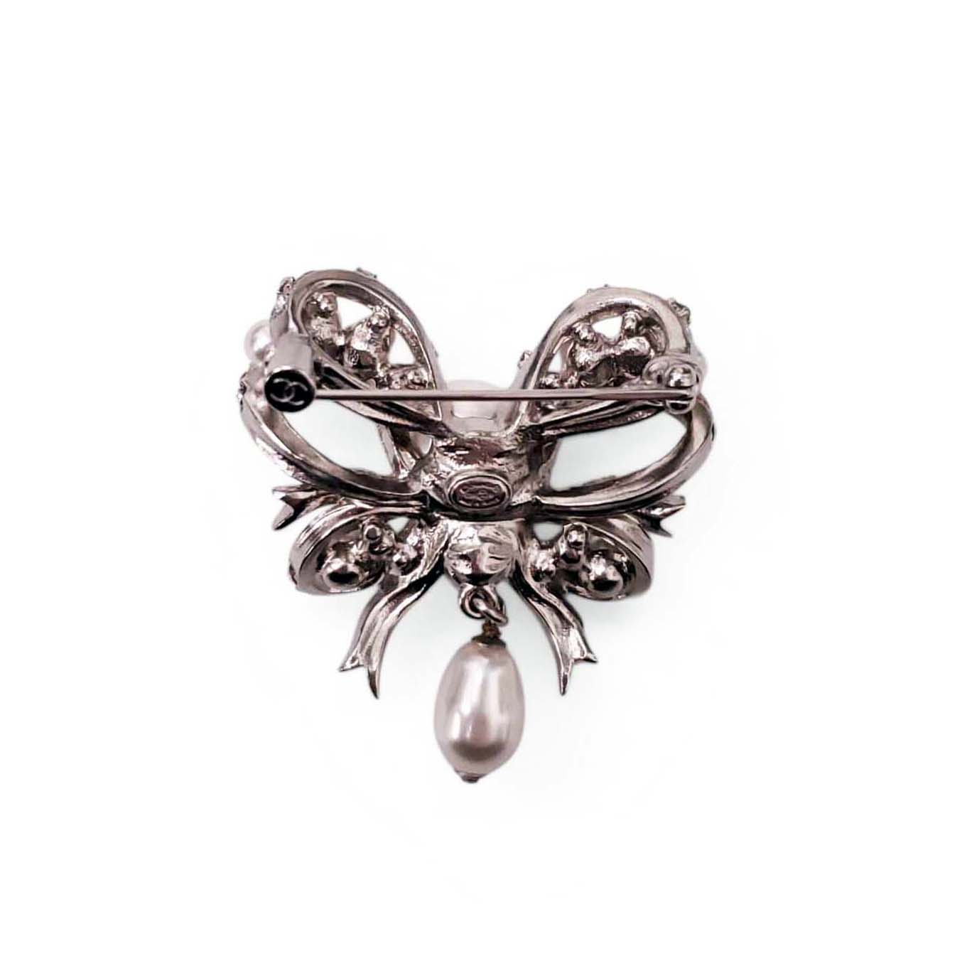 CHANEL CRYSTAL AND PEARL BOW BROOCH