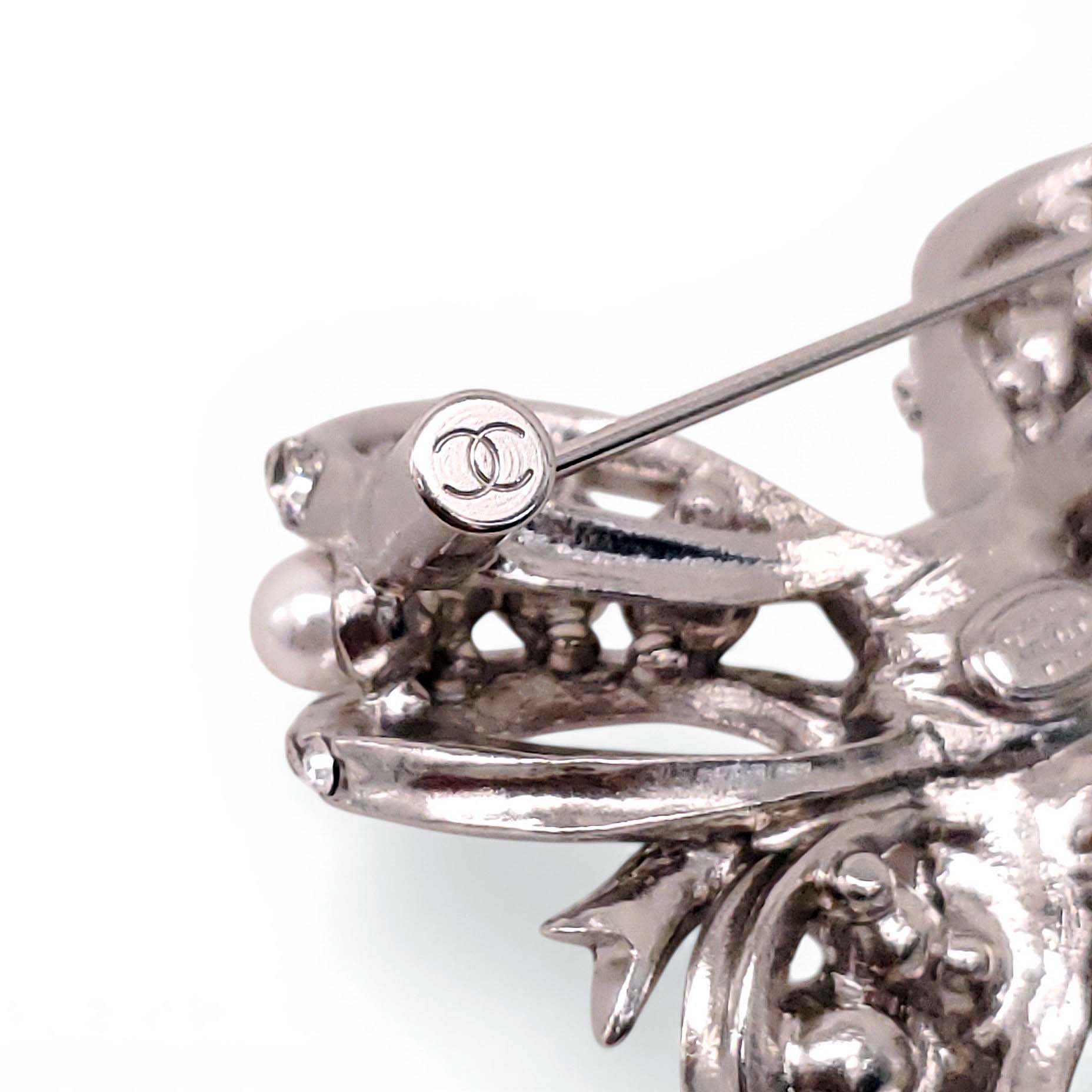 CHANEL CRYSTAL AND PEARL BOW BROOCH