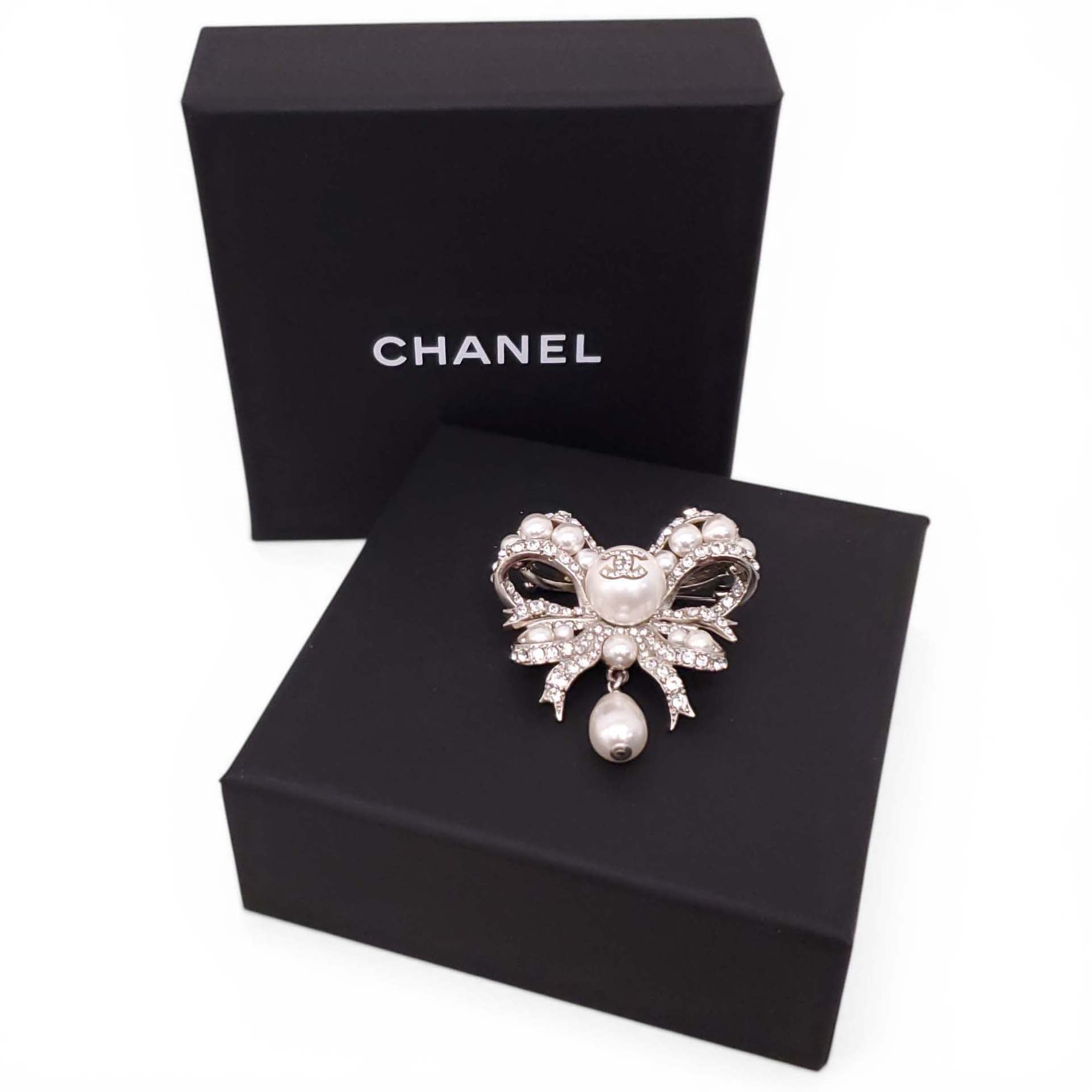 CHANEL CRYSTAL AND PEARL BOW BROOCH
