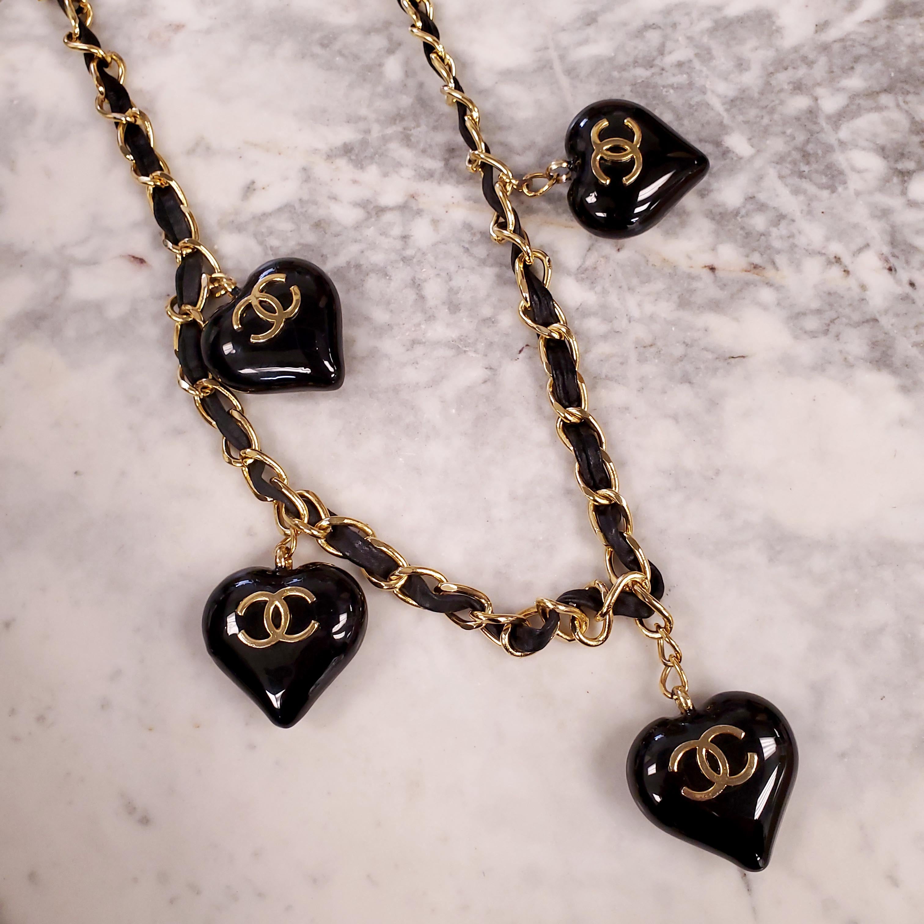 CHANEL LEATHER AND GOLD NECKLACE WITH LARGE CC LOGO HEARTS