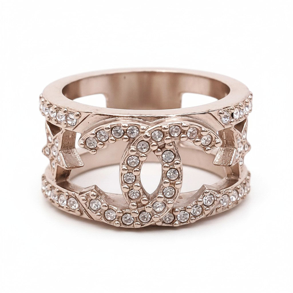 CHANEL METAL AND CRYSTAL CC LOGO STAR RING - SIZE 7.5