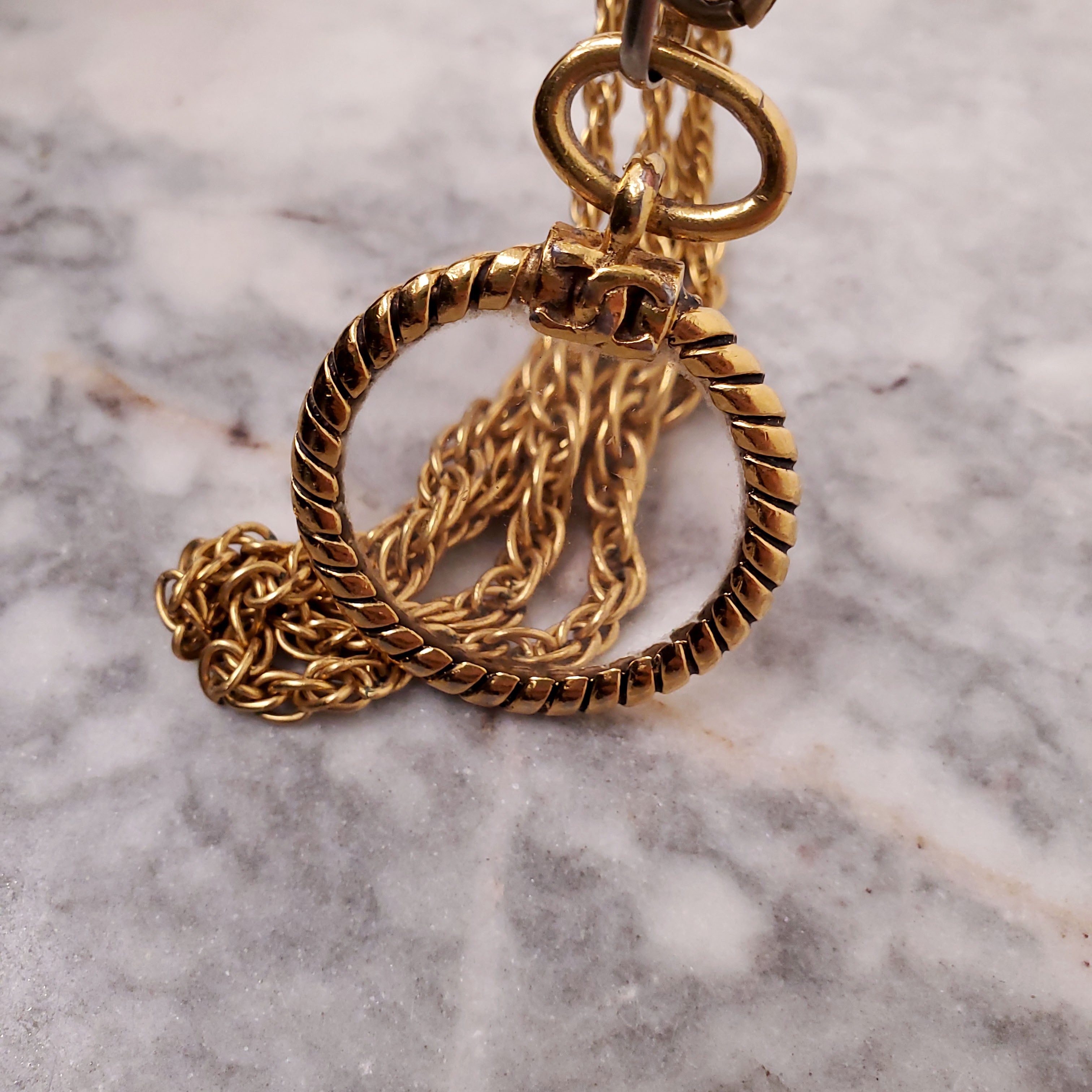 CHANEL NECKLACE WITH MAGNIFYING GLASS