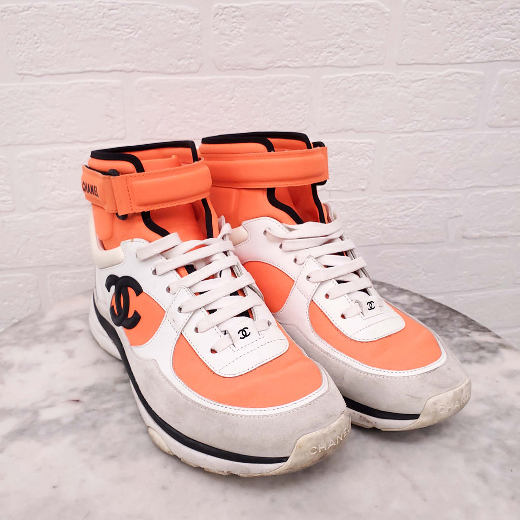 CHANEL NEON ORANGE HIGH TOP LOGO SNEAKERS - SIZE 39.5