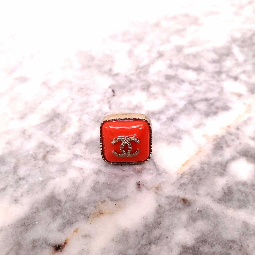 CHANEL ORANGE LOGO RING - SIZE 5