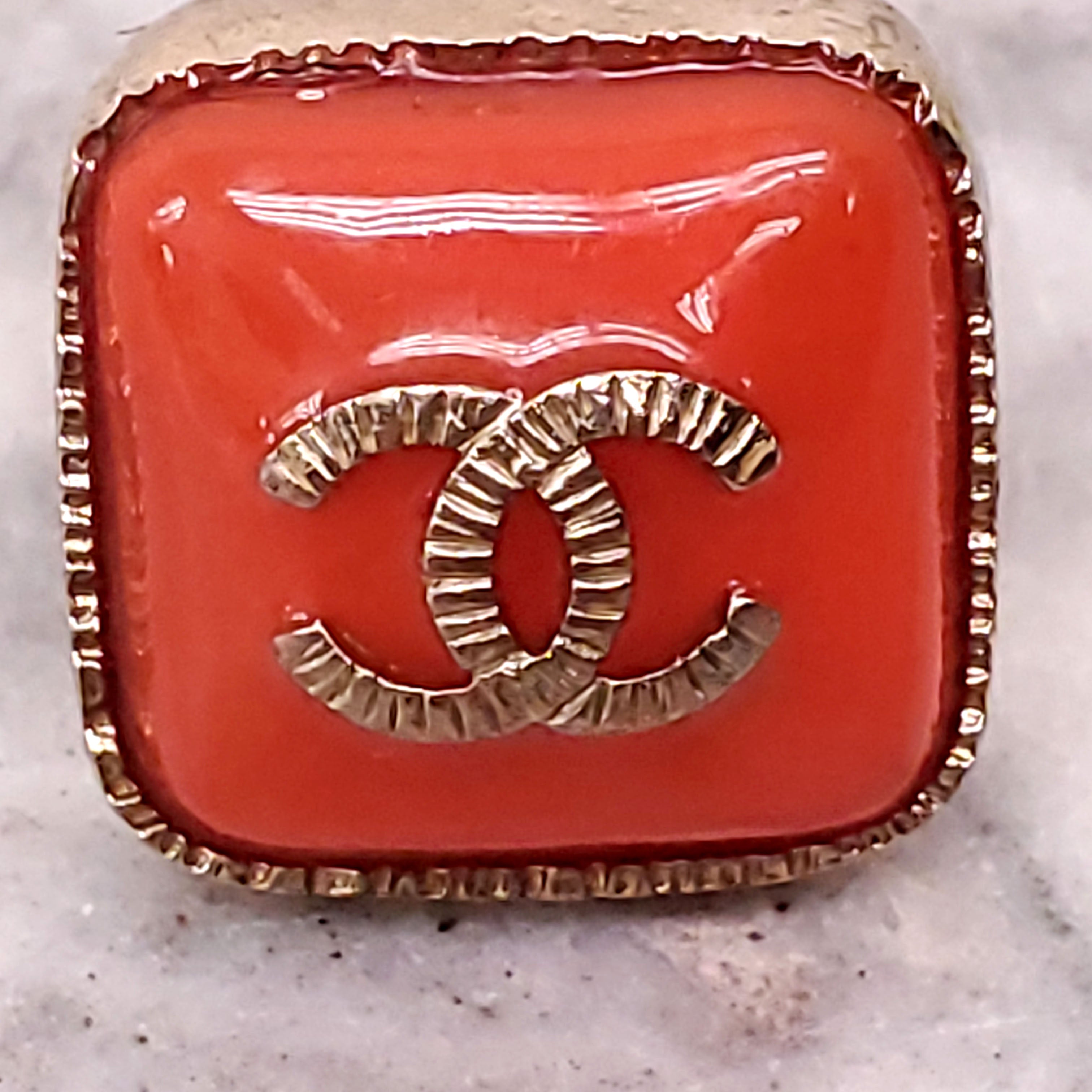 CHANEL ORANGE LOGO RING - SIZE 5