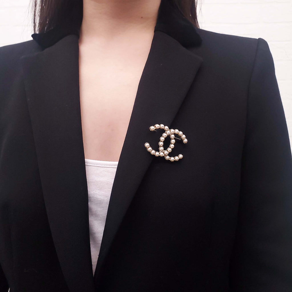 CHANEL PEARL LOGO BROOCH