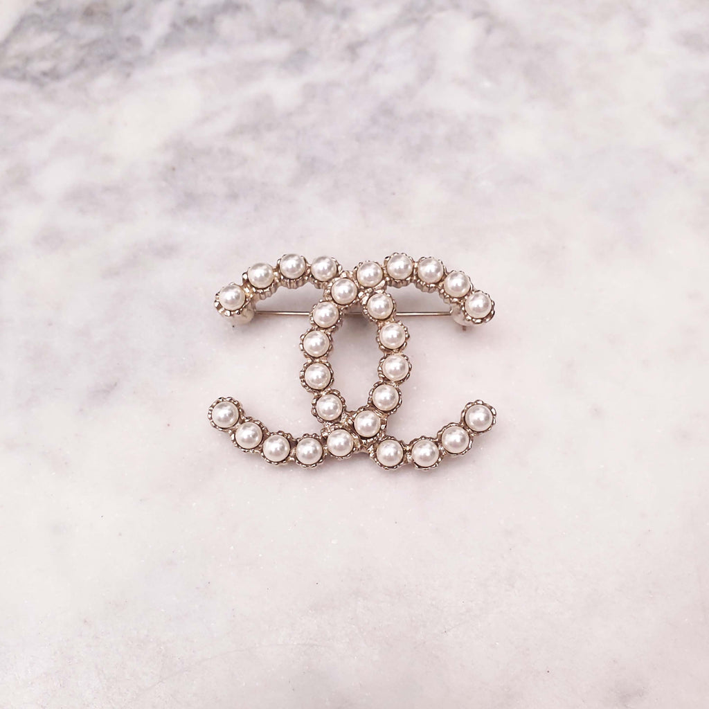 CHANEL PEARL LOGO BROOCH