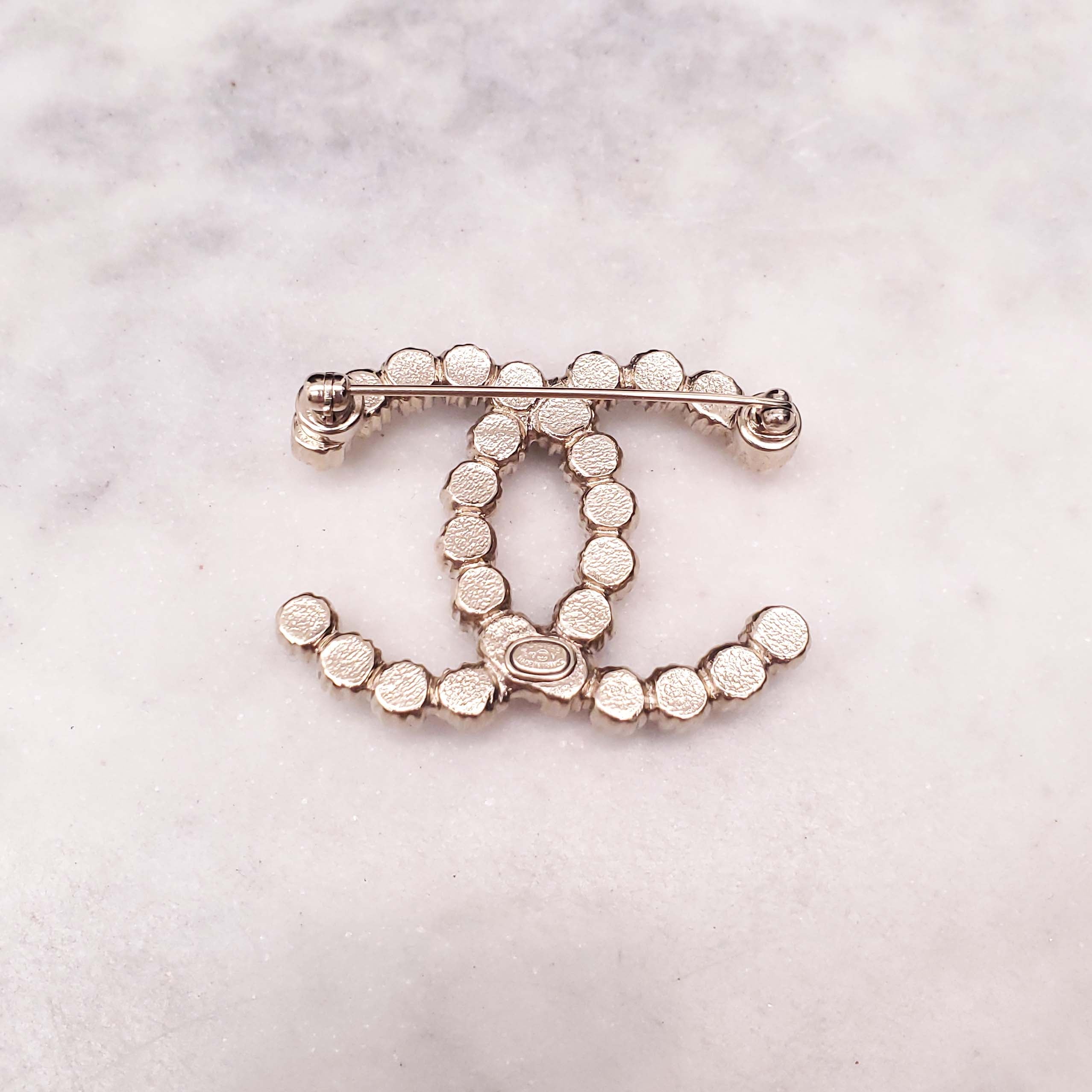 CHANEL PEARL LOGO BROOCH