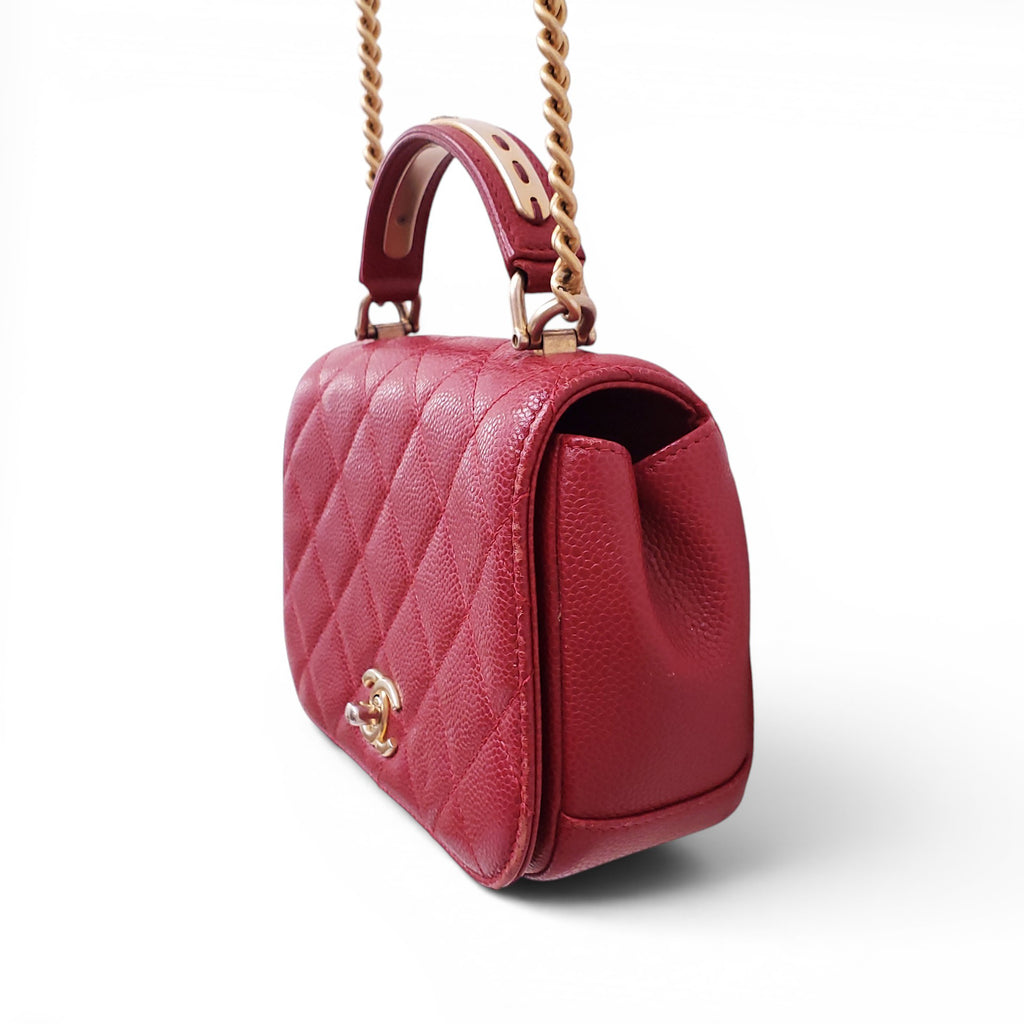 CHANEL RED QUILTED CARRY AROUND FLAP BAG