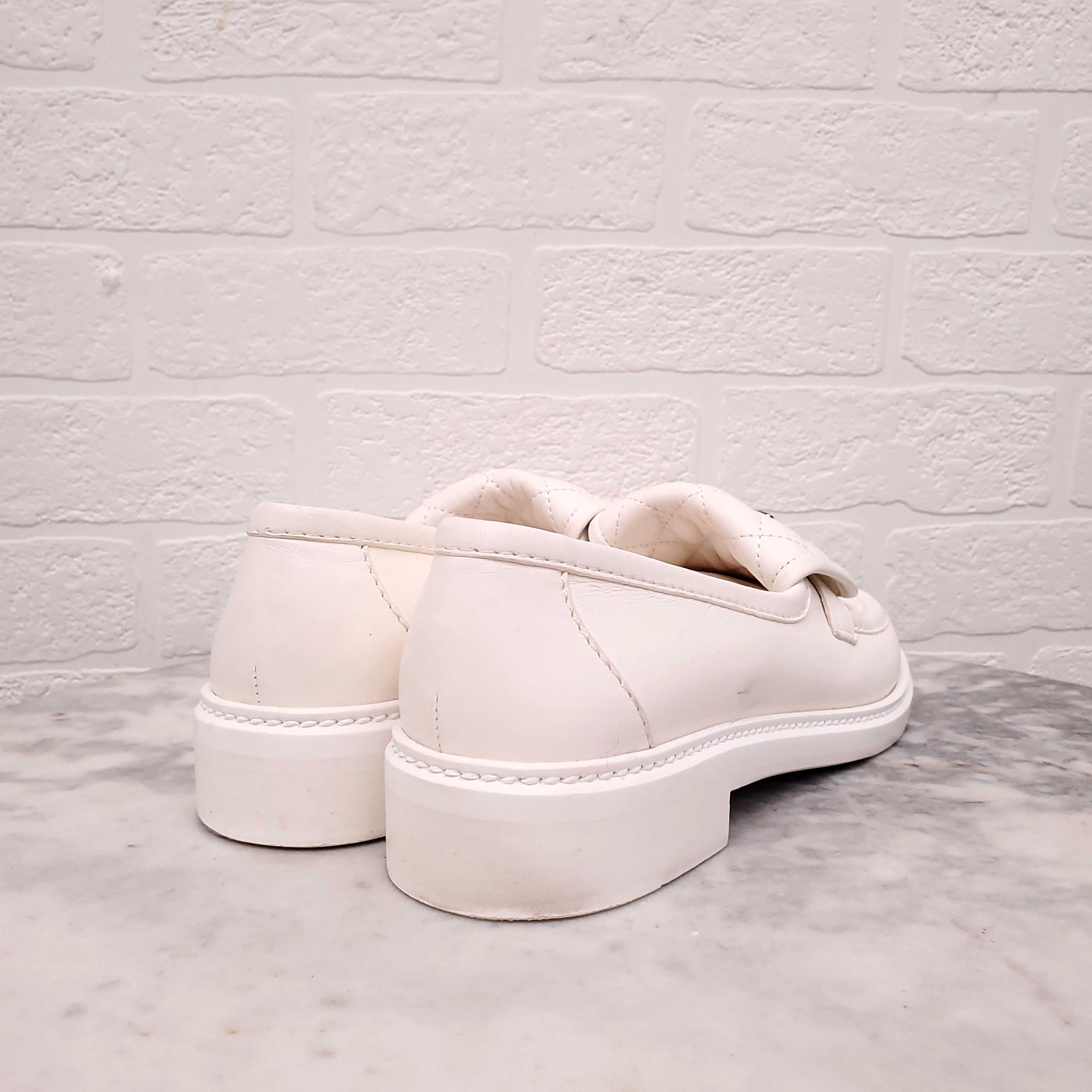 CHANEL WHITE LEATHER LOAFERS - SIZE 38.5